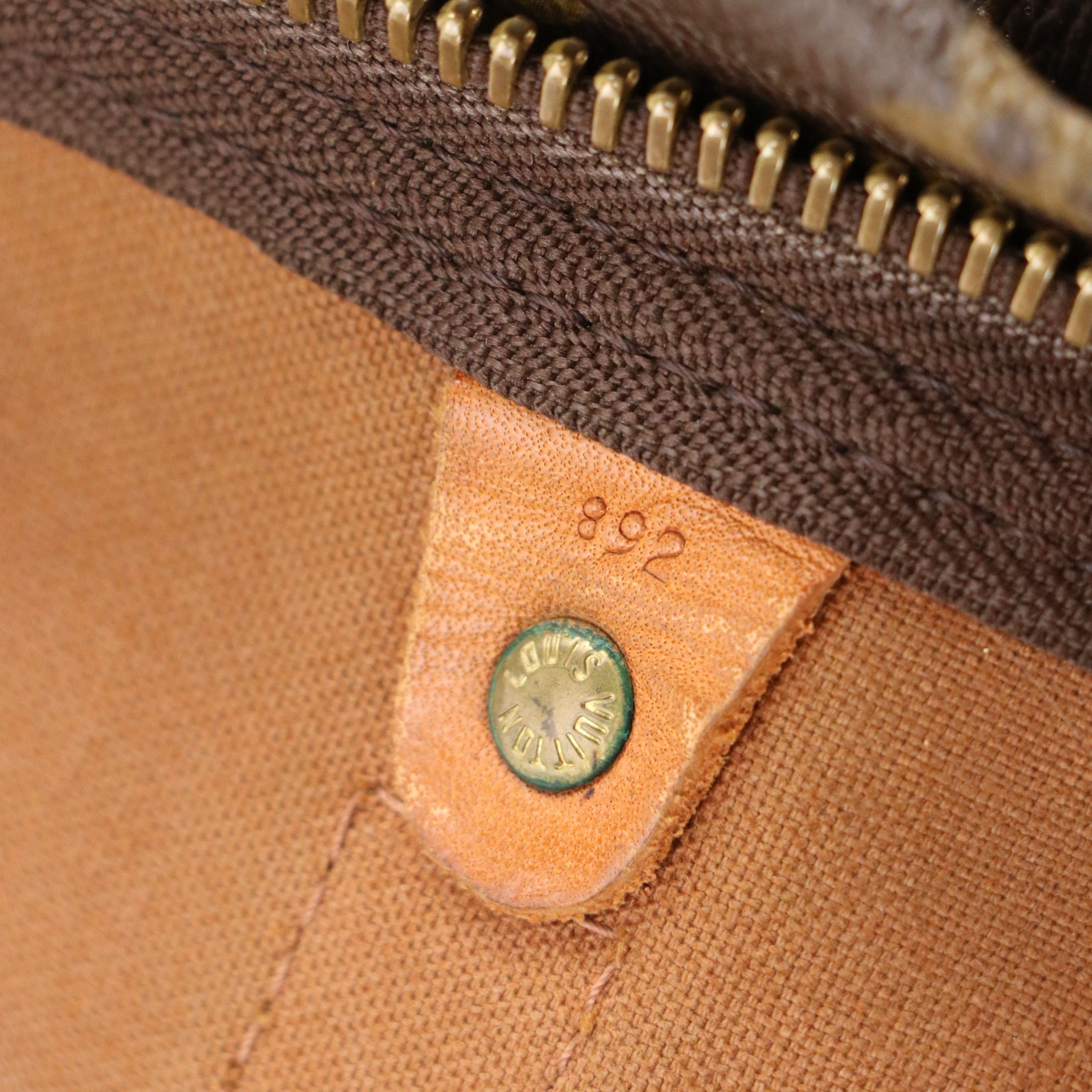 Louis Vuitton Keepall 50 Bandoulière Bag in Monogram Canvas and Vachetta Leather