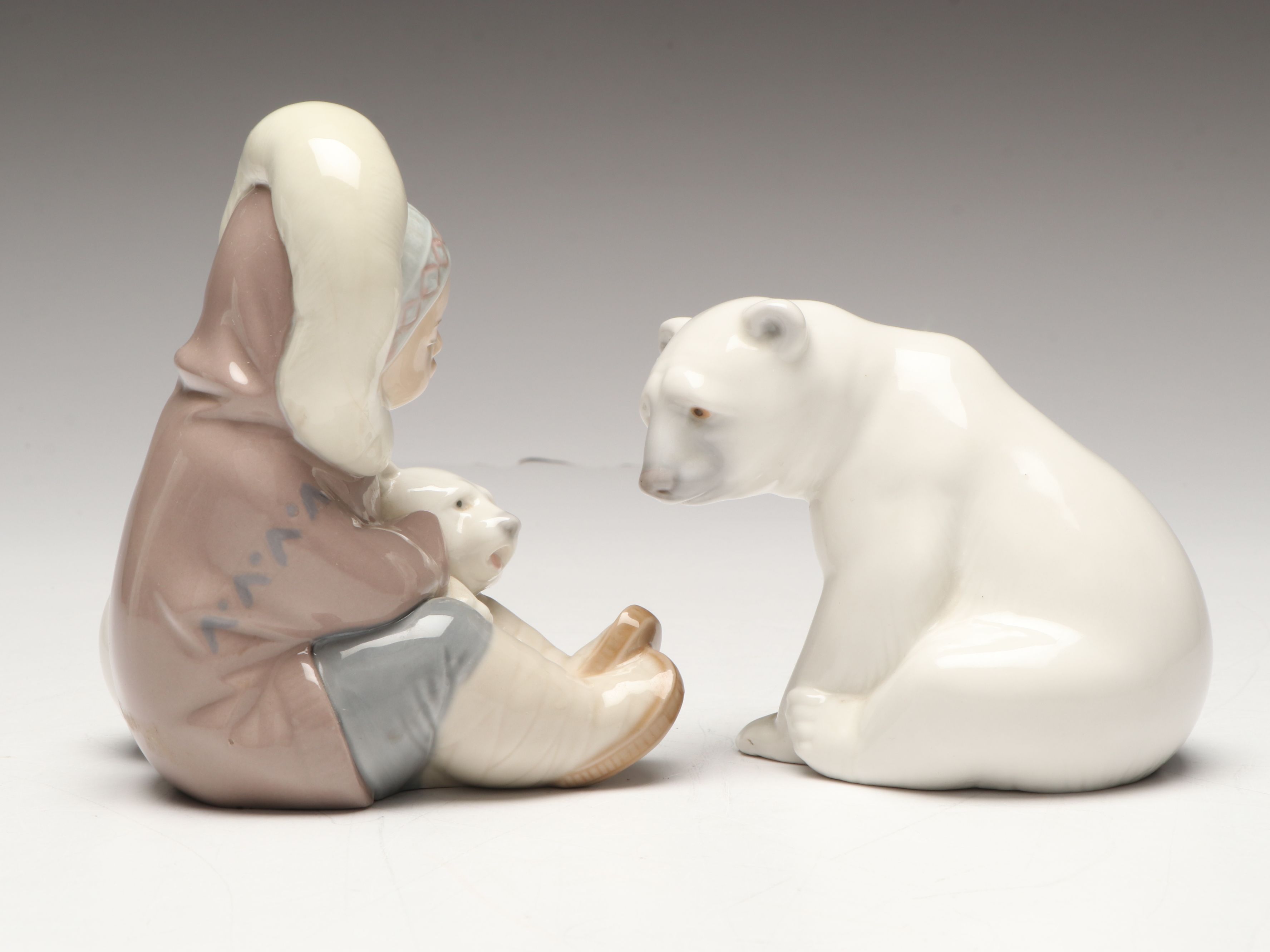 Lladró Inuit and "Seated Polar Bear" Porcelain Figurines