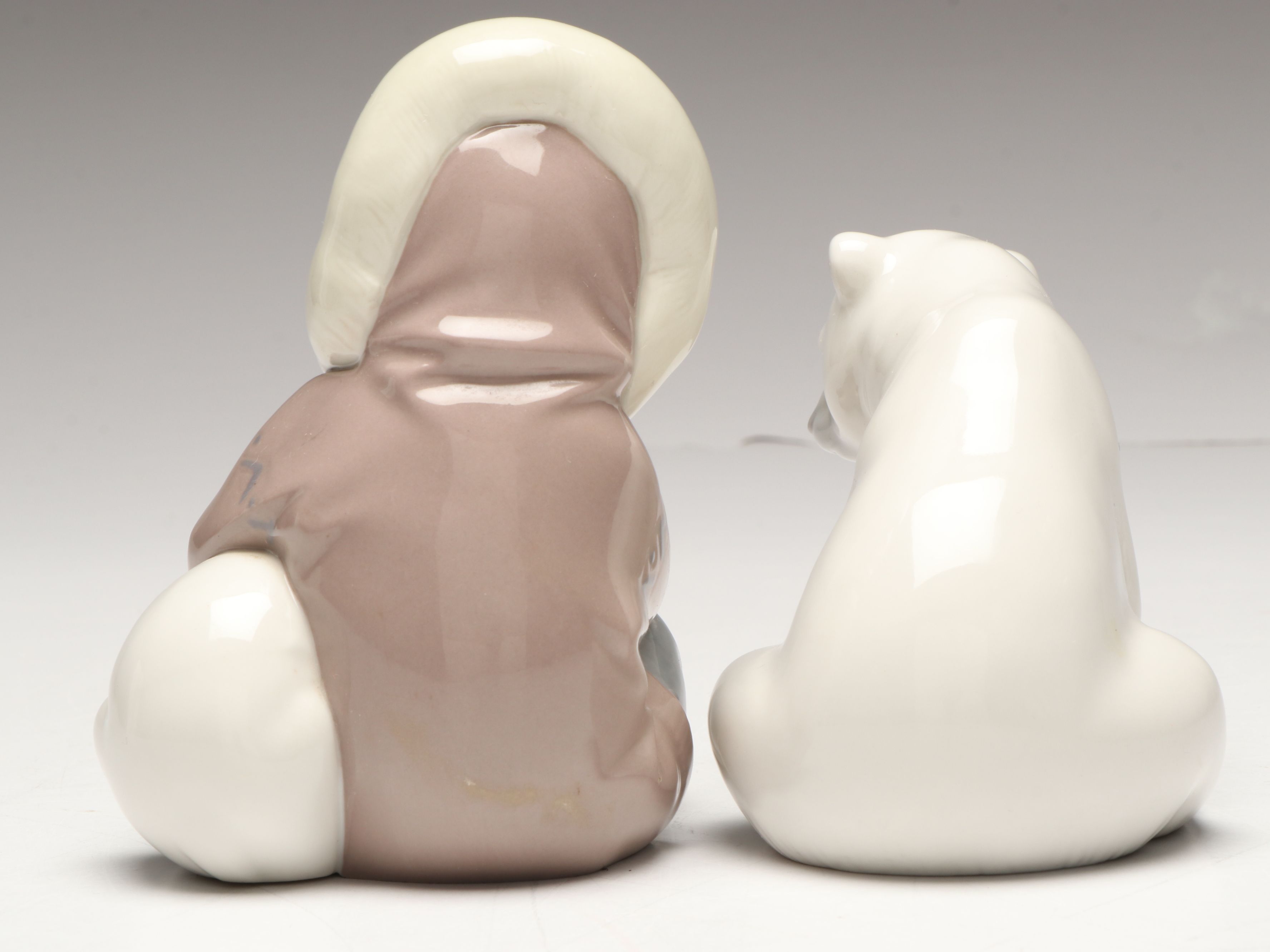 Lladró Inuit and "Seated Polar Bear" Porcelain Figurines