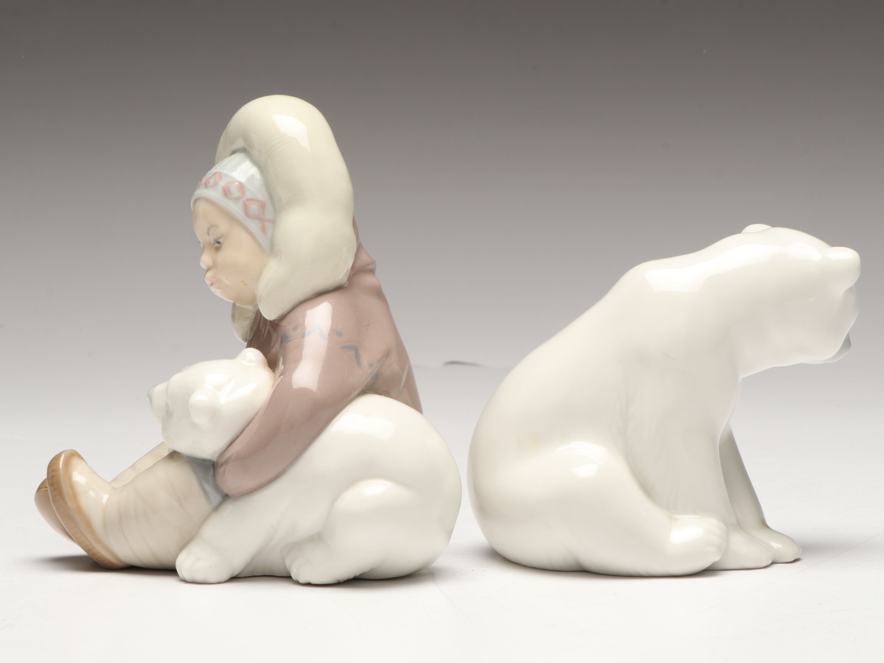 Lladró Inuit and "Seated Polar Bear" Porcelain Figurines