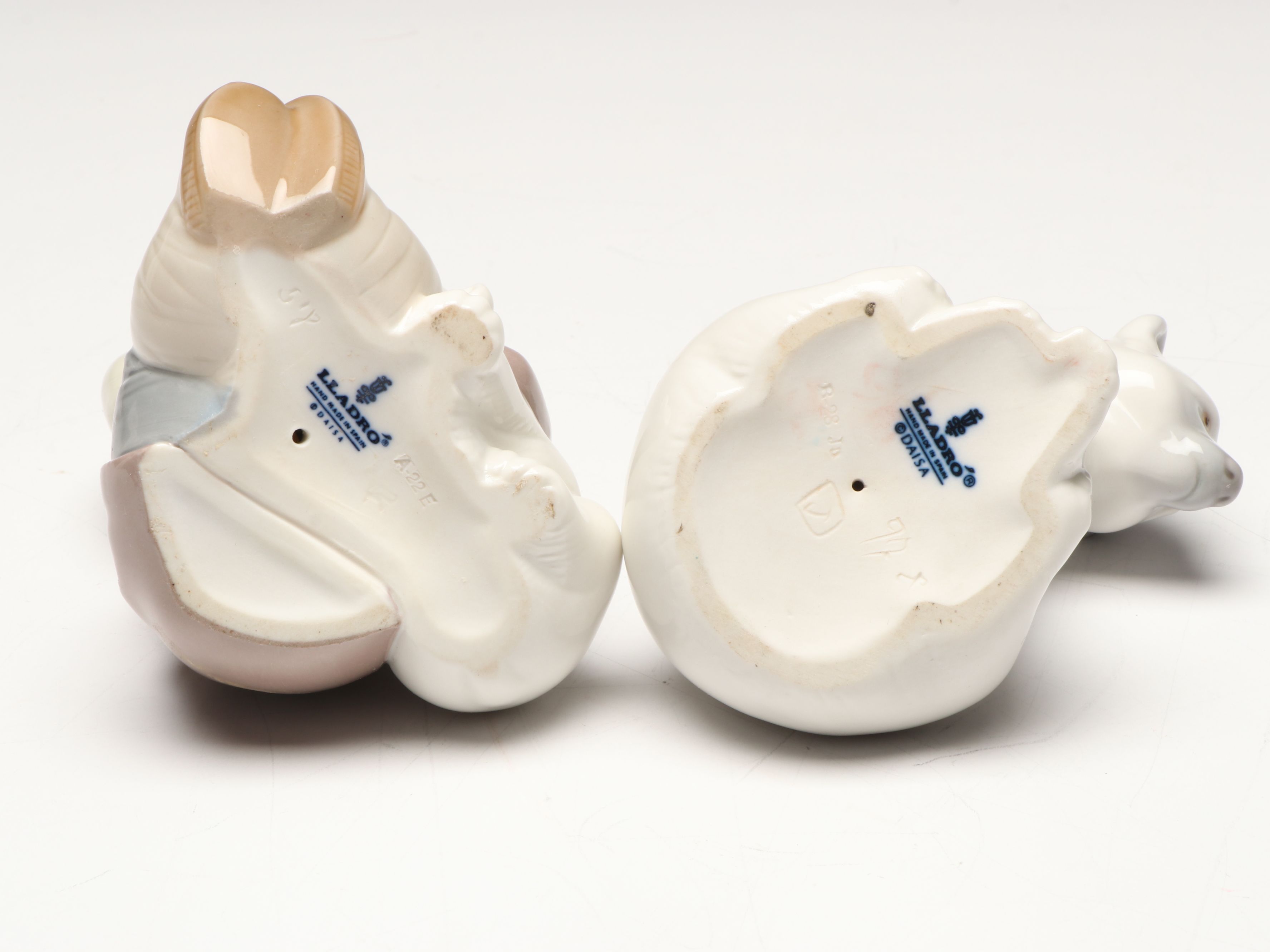 Lladró Inuit and "Seated Polar Bear" Porcelain Figurines