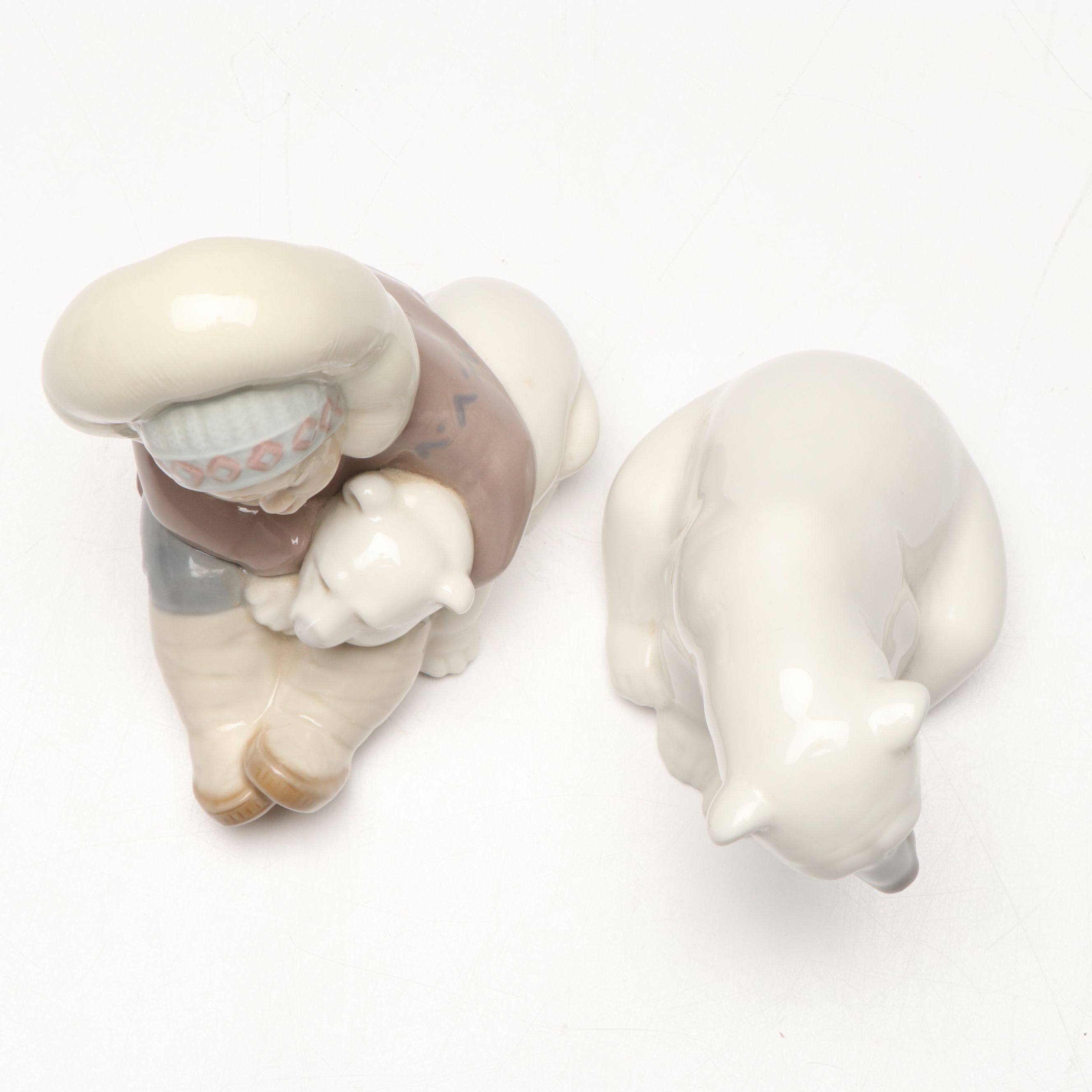 Lladró Inuit and "Seated Polar Bear" Porcelain Figurines