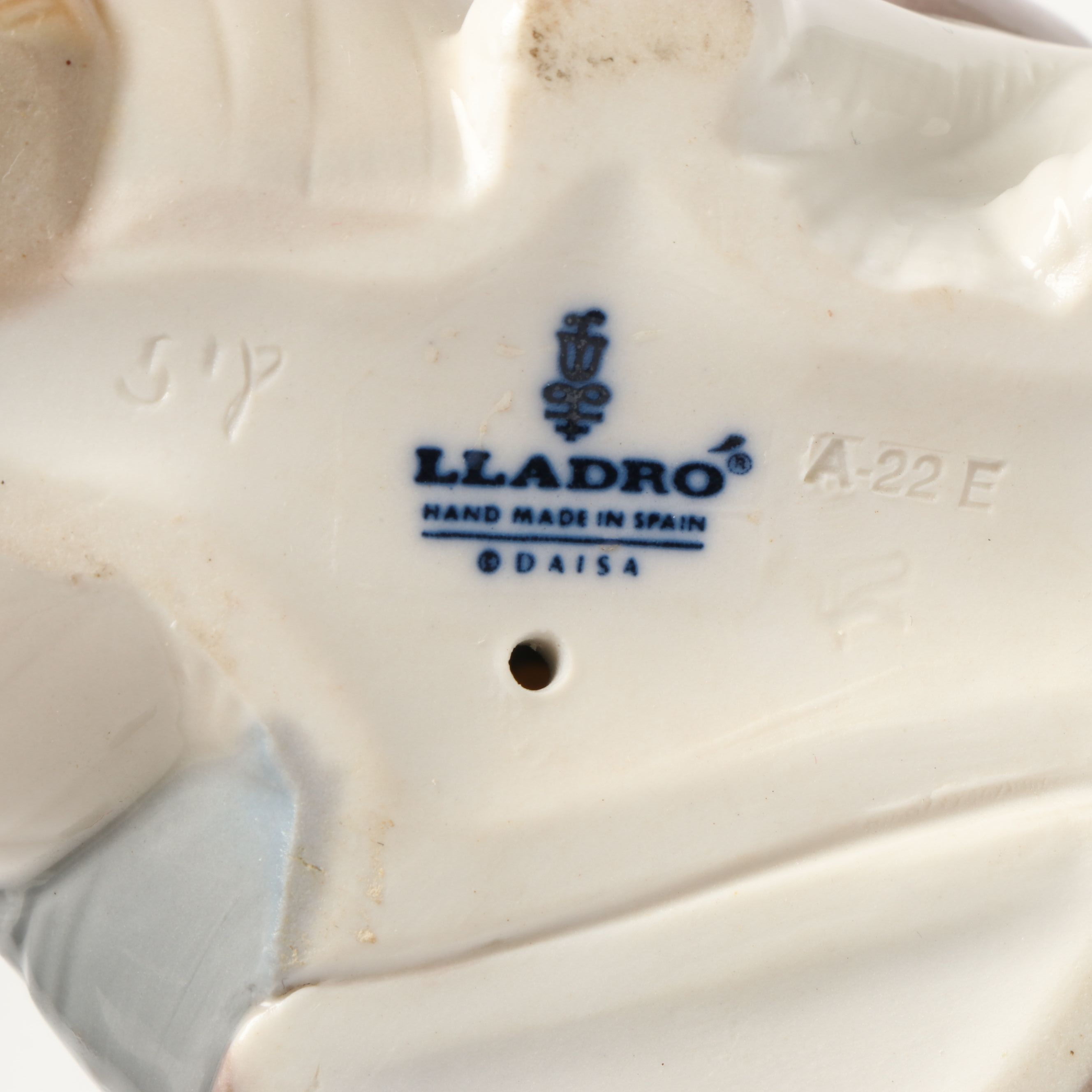 Lladró Inuit and "Seated Polar Bear" Porcelain Figurines