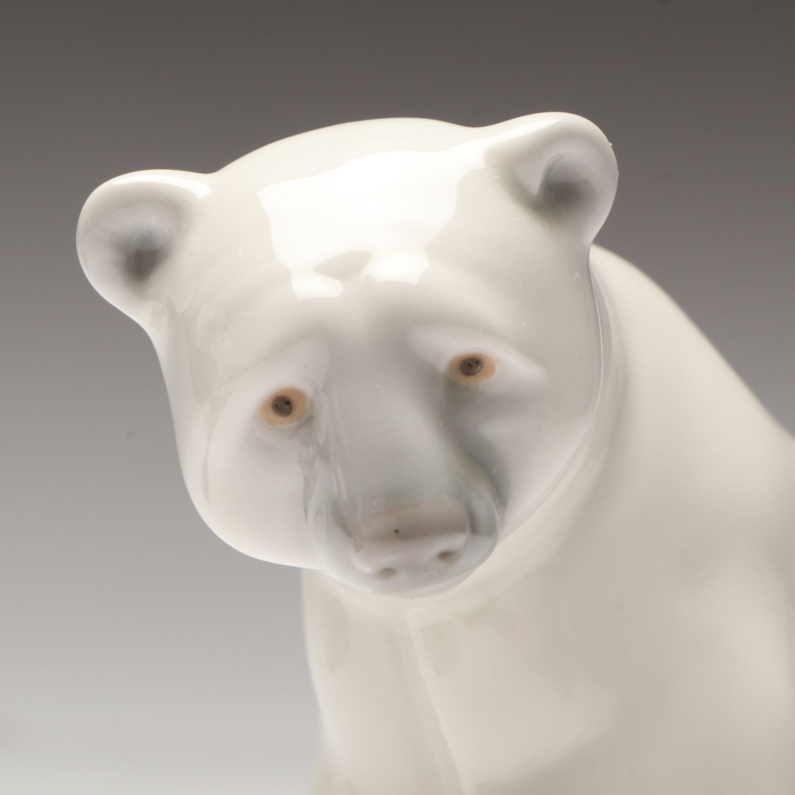 Lladró Inuit and "Seated Polar Bear" Porcelain Figurines
