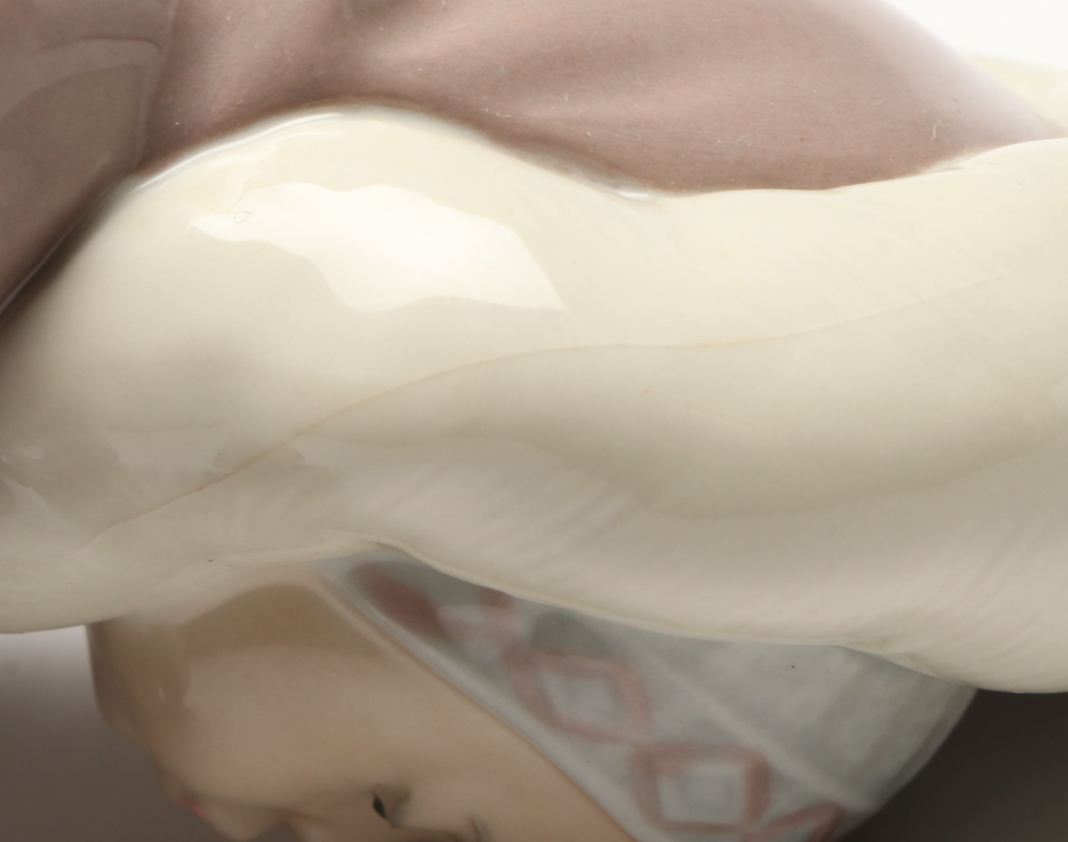 Lladró Inuit and "Seated Polar Bear" Porcelain Figurines