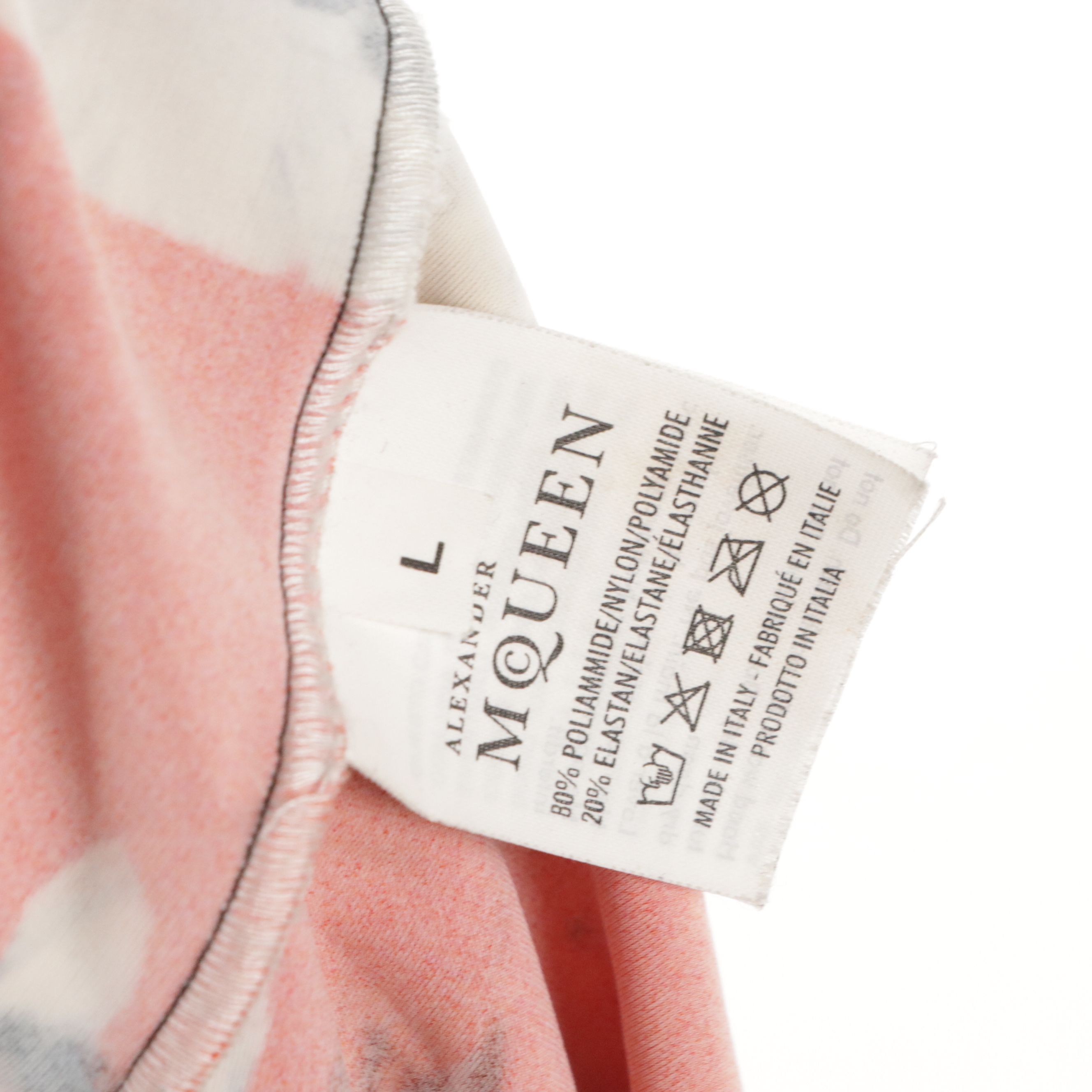 Maison Margiela Sleeveless Wrap Cardigan and Alexander McQueen Printed Leggings