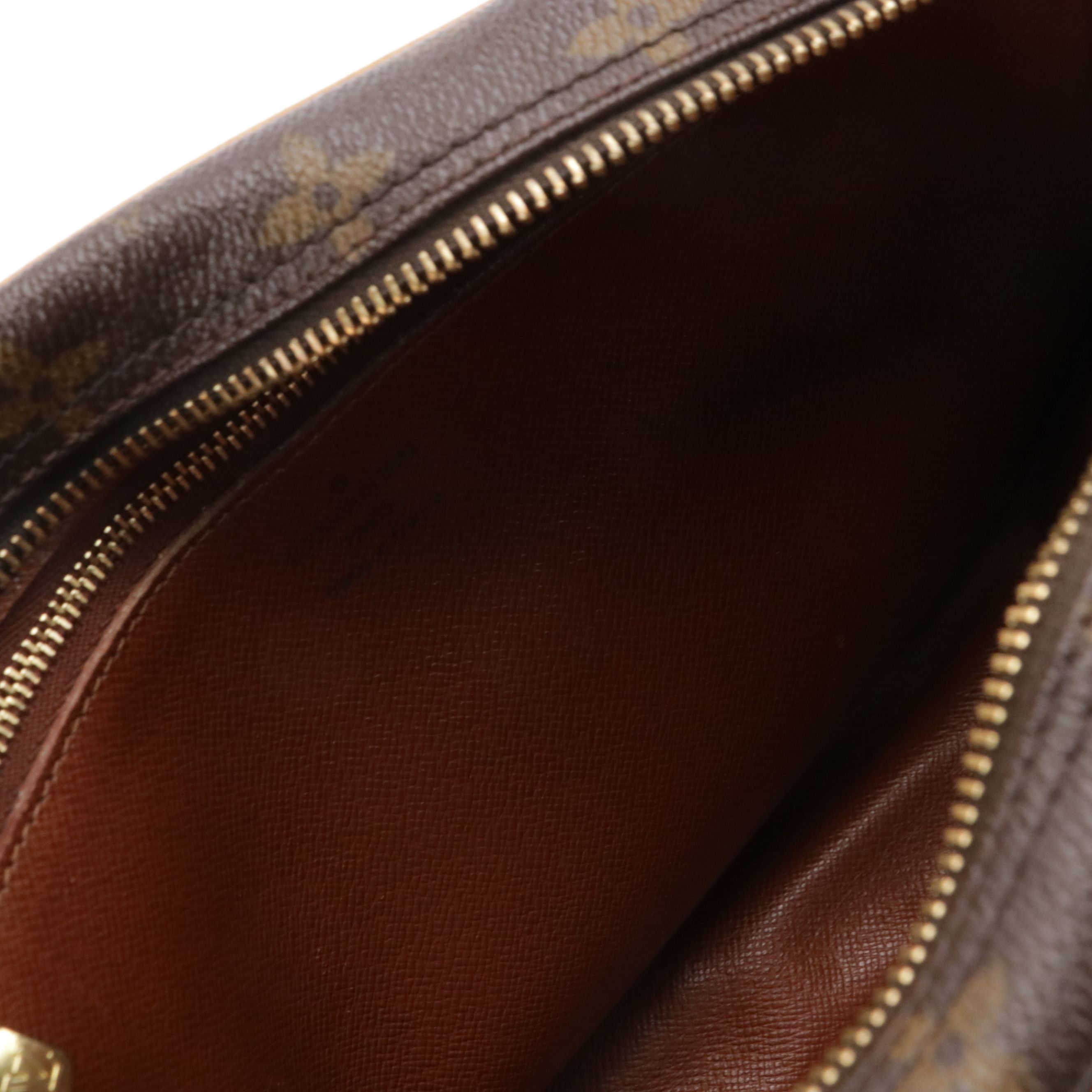 Louis Vuitton Jeune Fille MM Bag in Monogram Canvas and Vachetta Leather