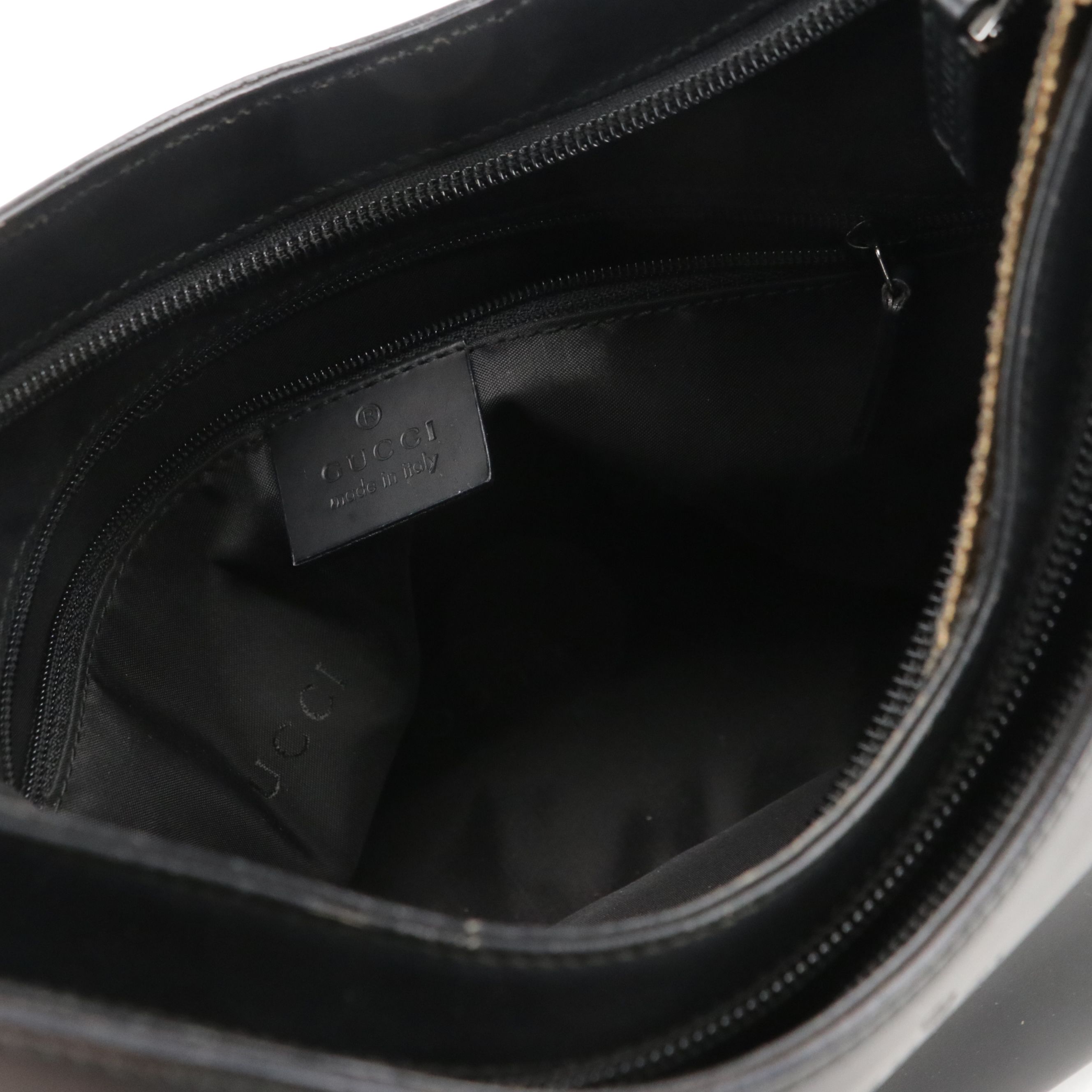 Gucci Black Leather Shoulder Bag with Sculptural Metal Strap Handle