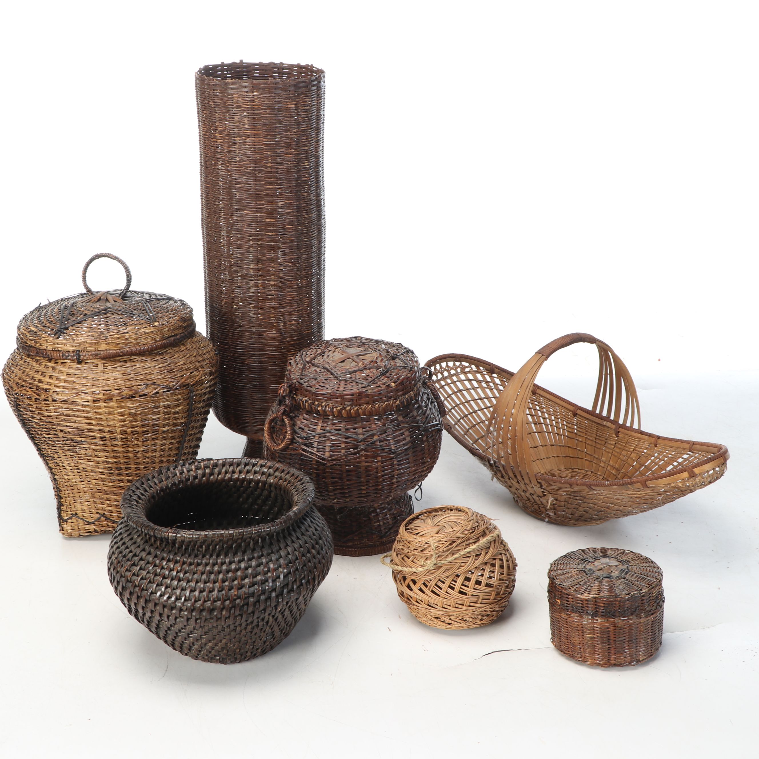 Vintage Handwoven Rattan Canoe Basket with Wicker Boxes and Other Décor