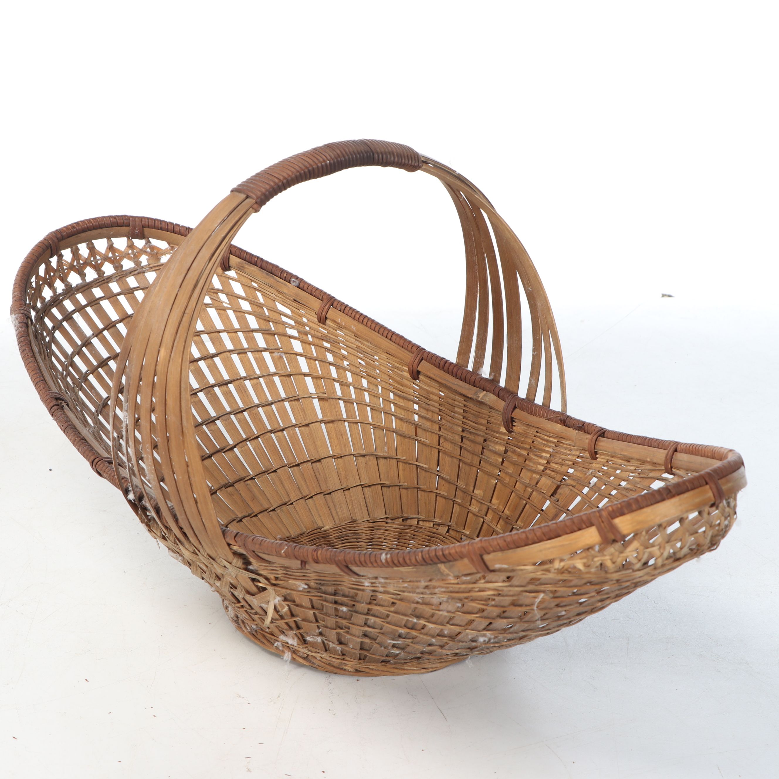 Vintage Handwoven Rattan Canoe Basket with Wicker Boxes and Other Décor