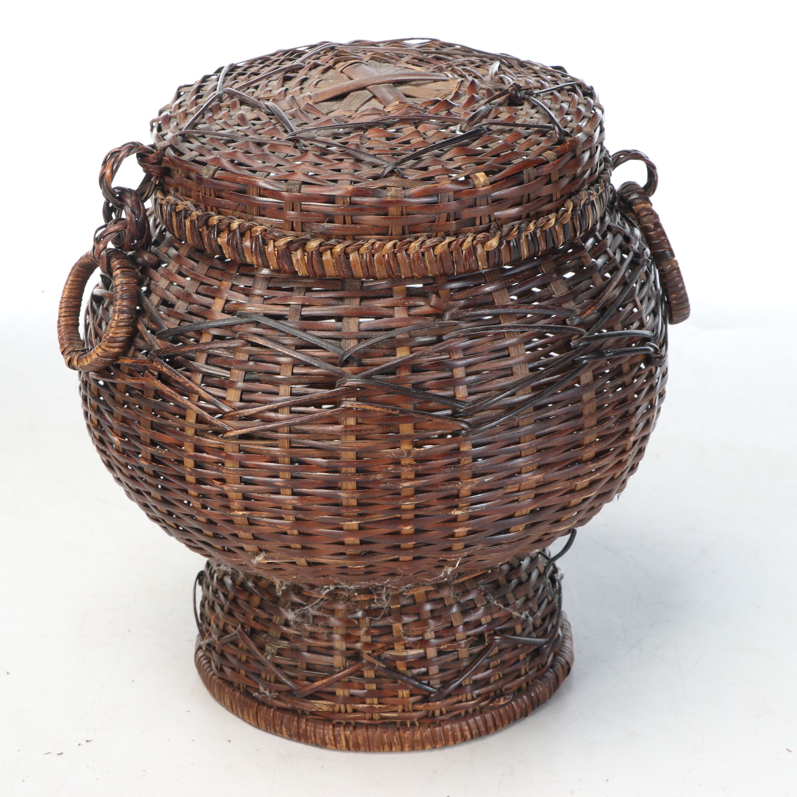 Vintage Handwoven Rattan Canoe Basket with Wicker Boxes and Other Décor