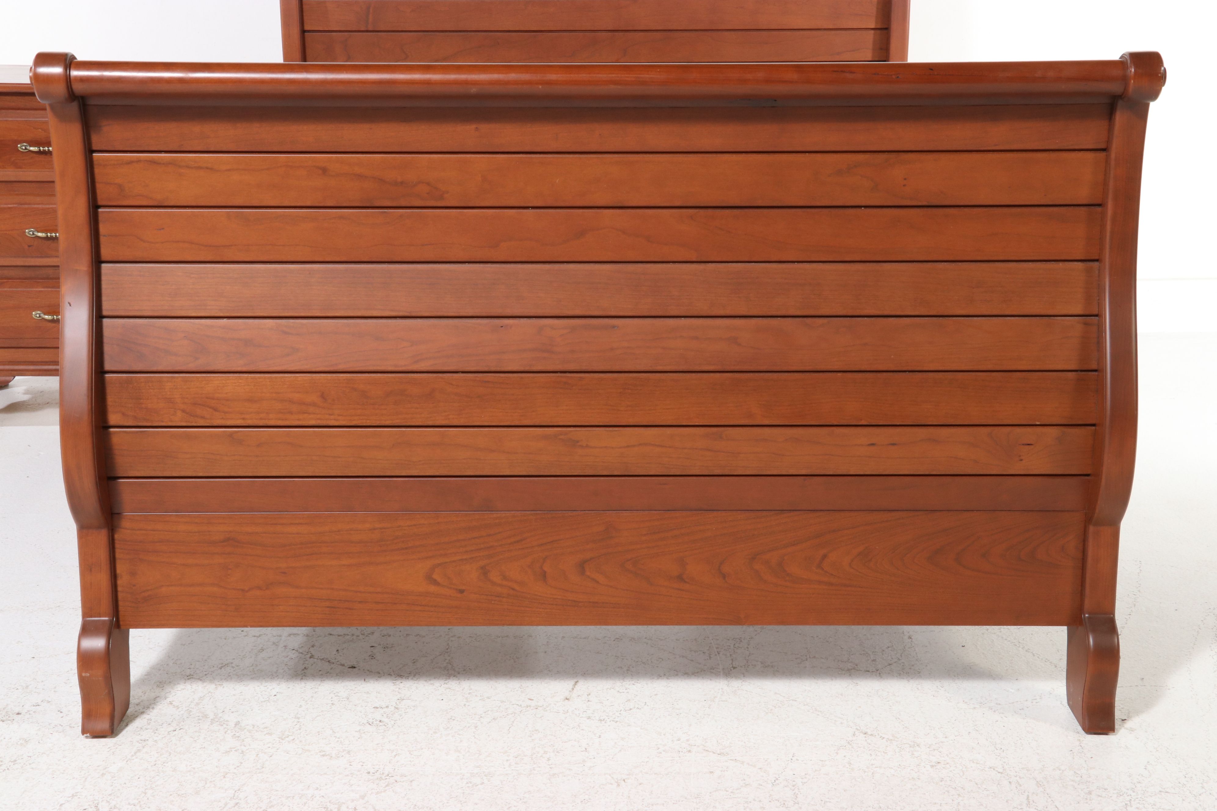 Slat-Panel Cherry Wood Sleigh Bed and Three-Drawer Nightstand