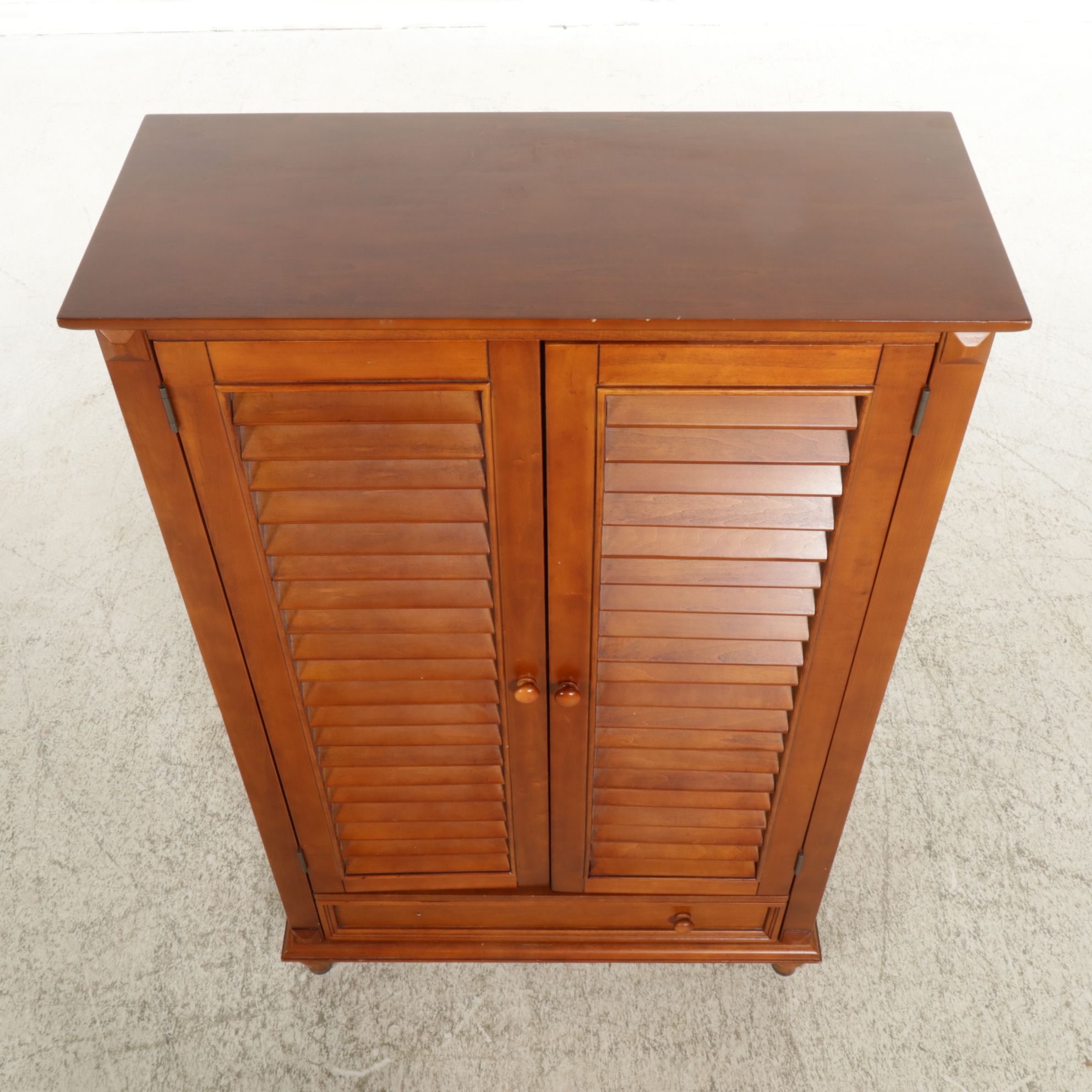 Cherry Finished Cabinet with Louvered Doors