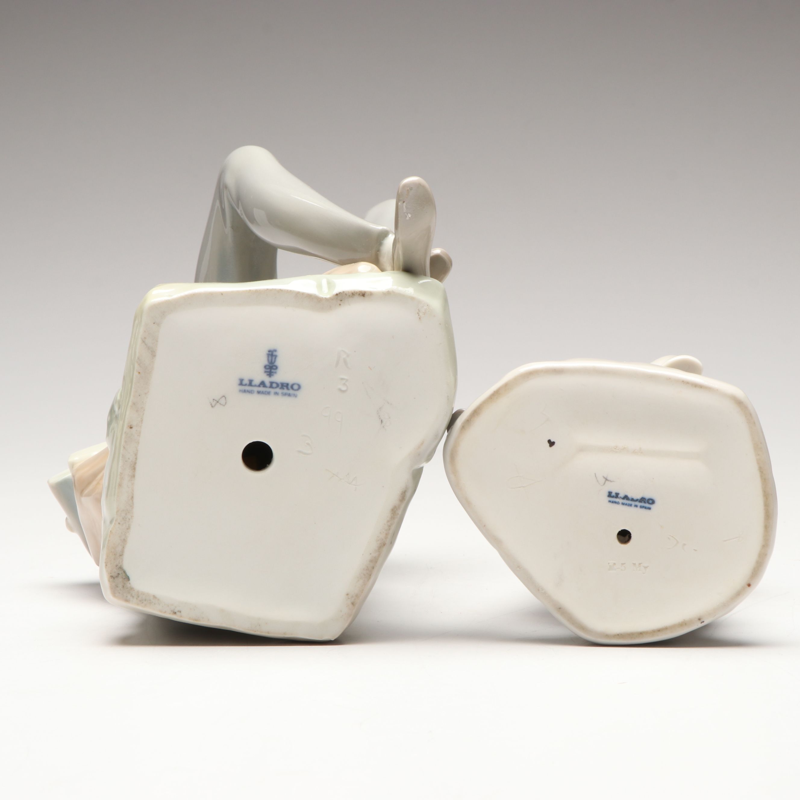 Lladró "Hebrew Student" and "Boy with Yacht" Porcelain Figurines