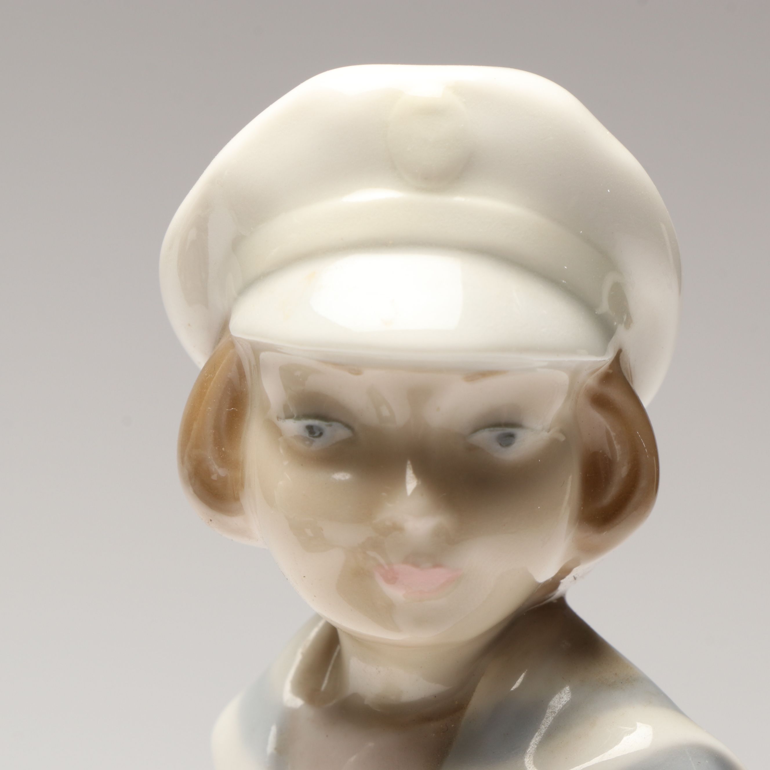 Lladró "Hebrew Student" and "Boy with Yacht" Porcelain Figurines