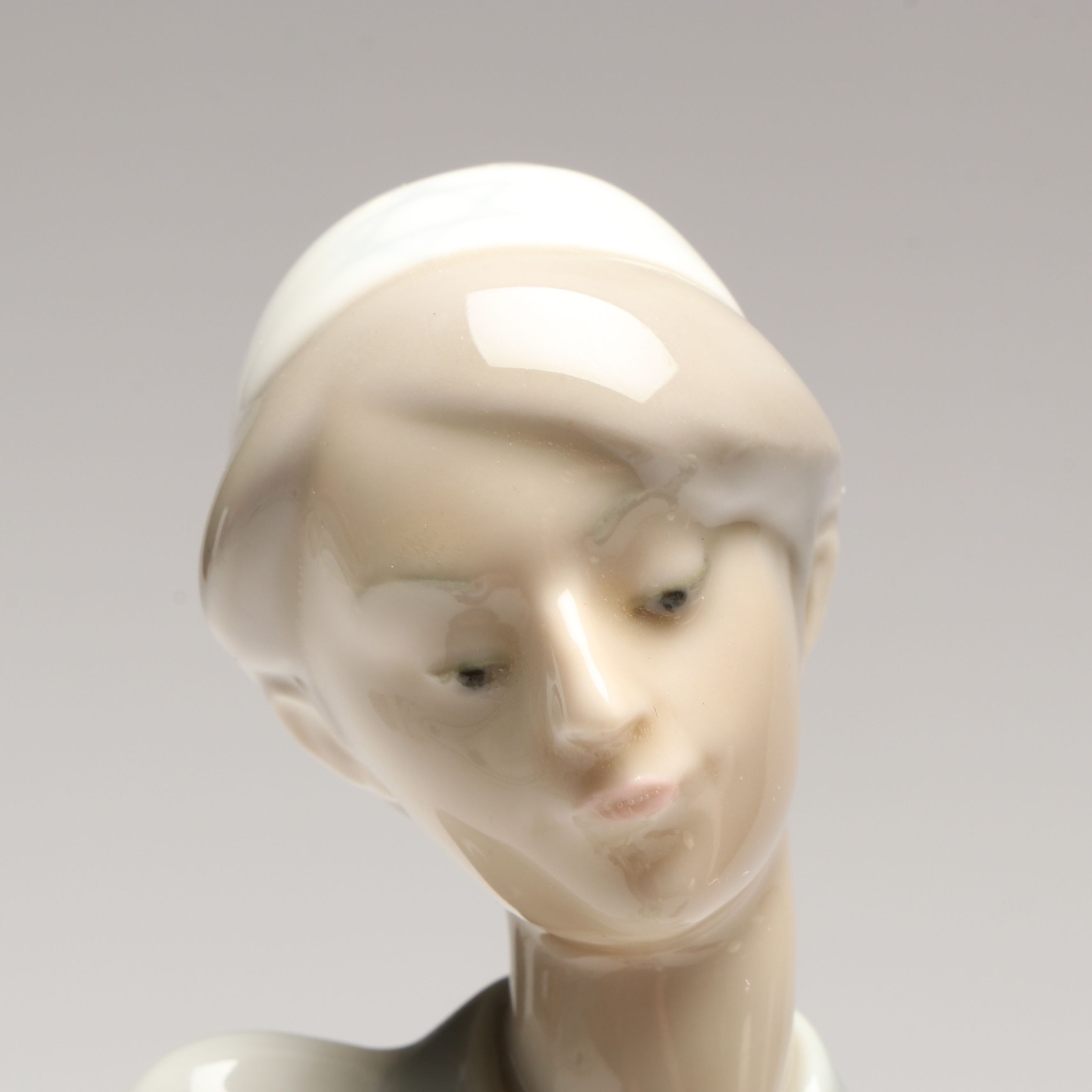 Lladró "Hebrew Student" and "Boy with Yacht" Porcelain Figurines