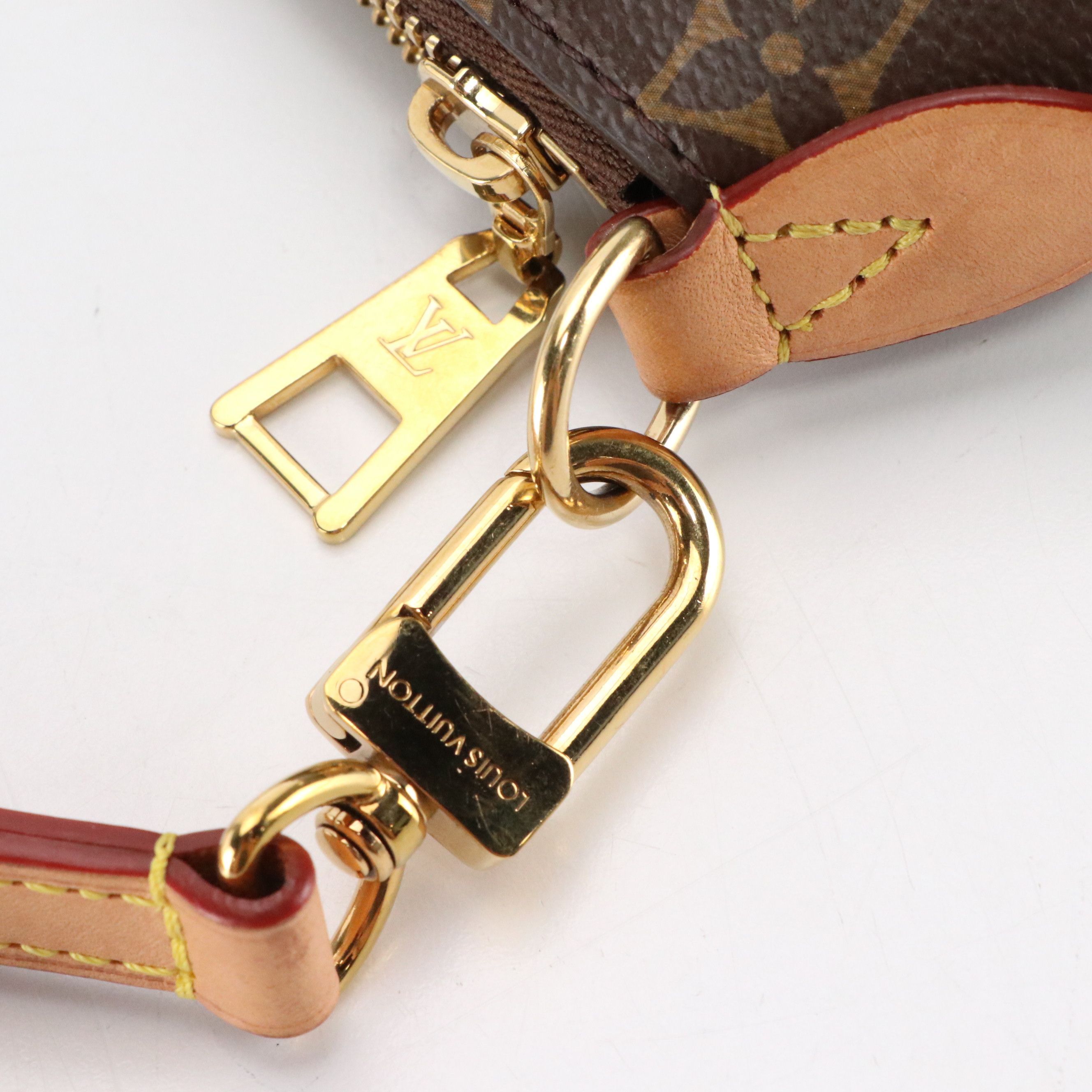 Louis Vuitton Boetie MM NM Two-Way Bag in Monogram Canvas and Vachetta Leather