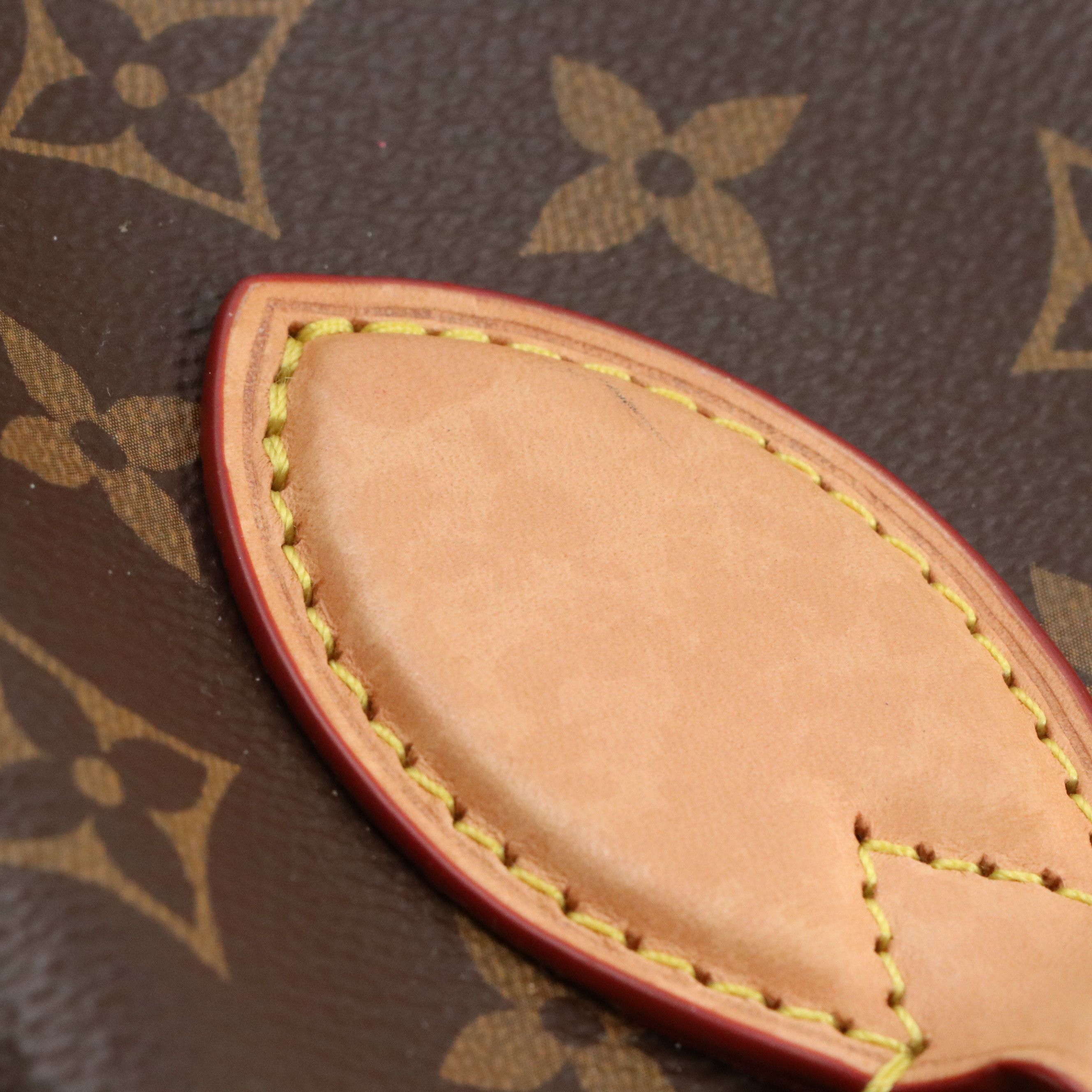 Louis Vuitton Boetie MM NM Two-Way Bag in Monogram Canvas and Vachetta Leather