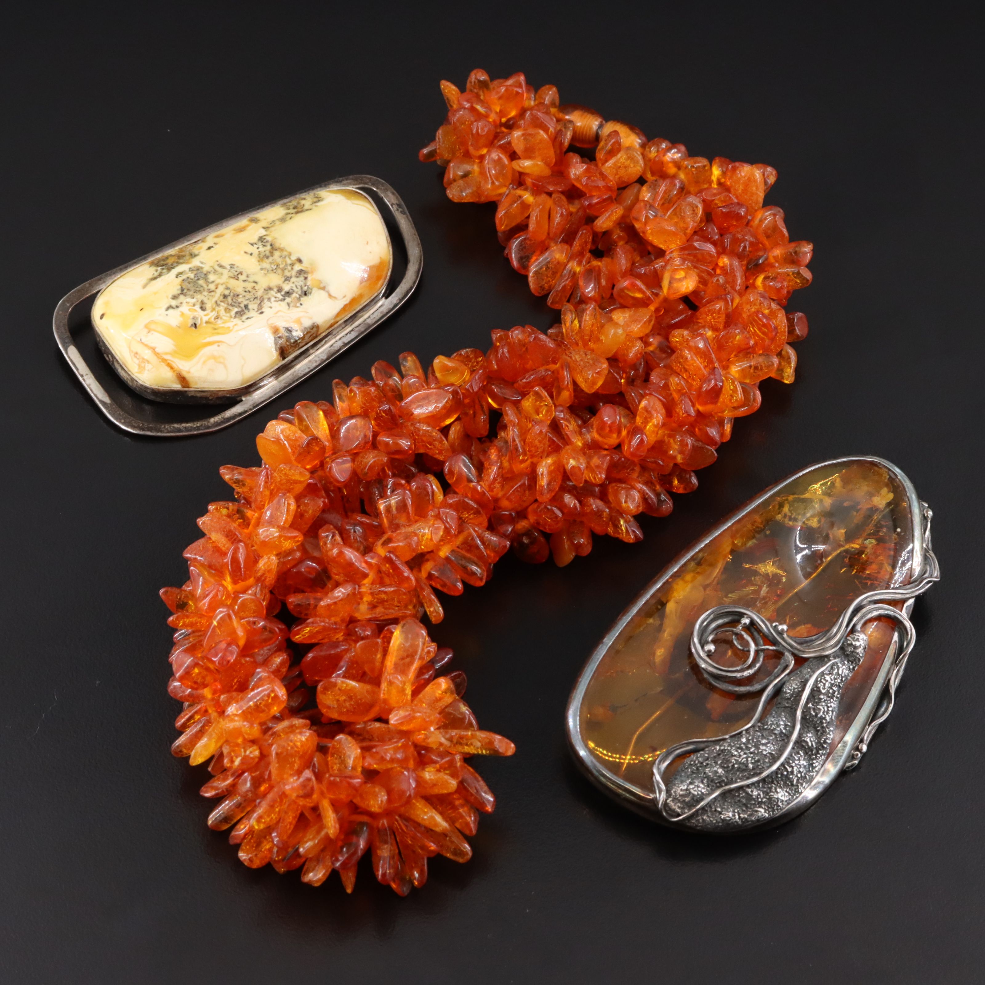 Amber and Copal Necklace and Sterling Brooches Including Bogdan Sawicki