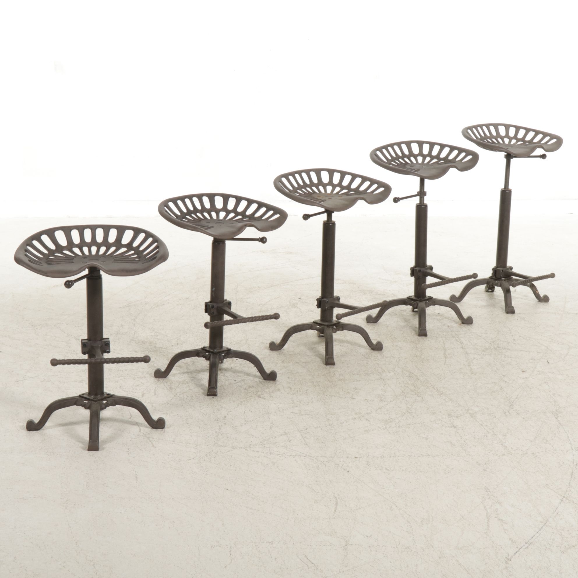 Five Rustic Industrial Style Tractor Seat Barstools
