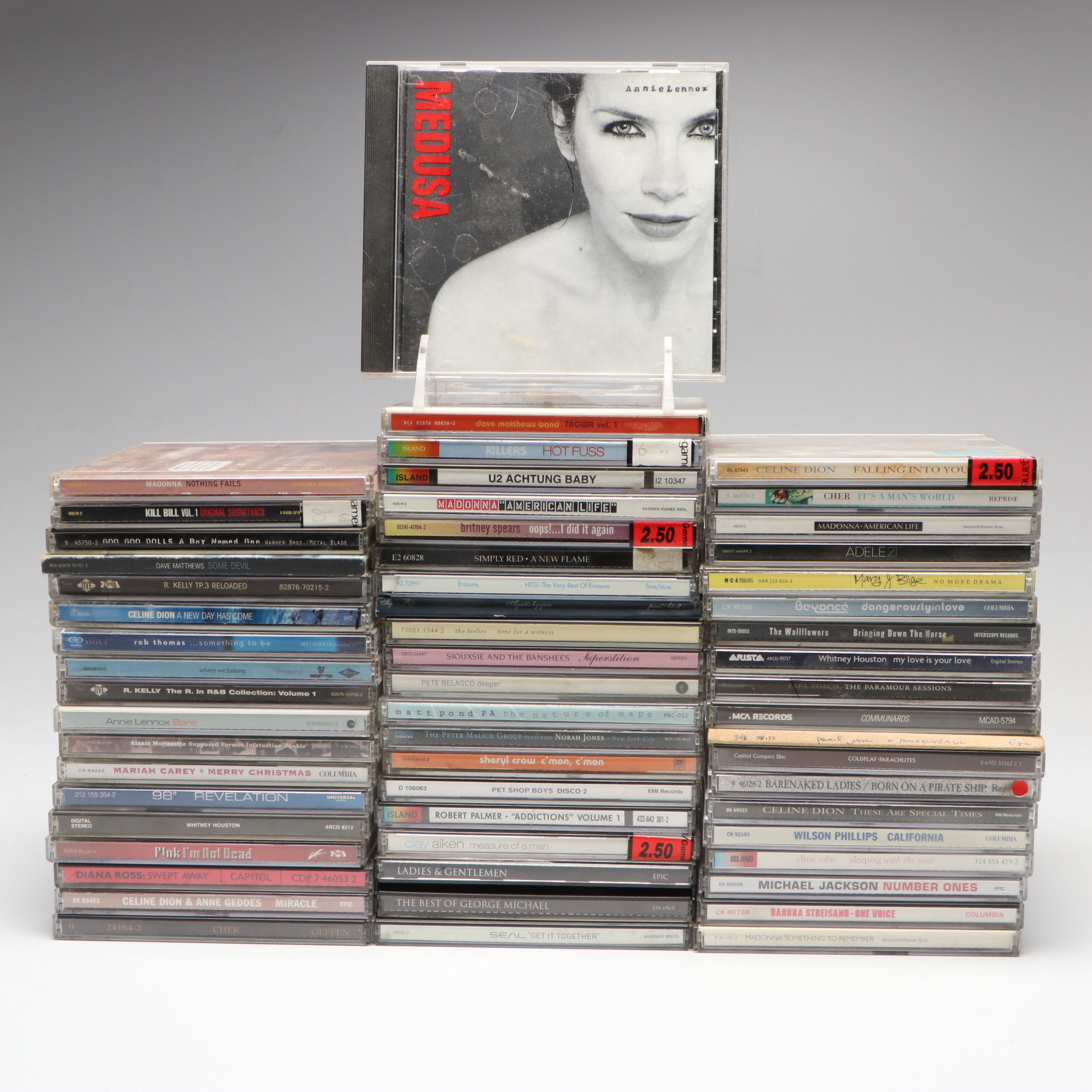 Whitney Houston, Madonna, Pearl Jam, Elton John and More Music CDs