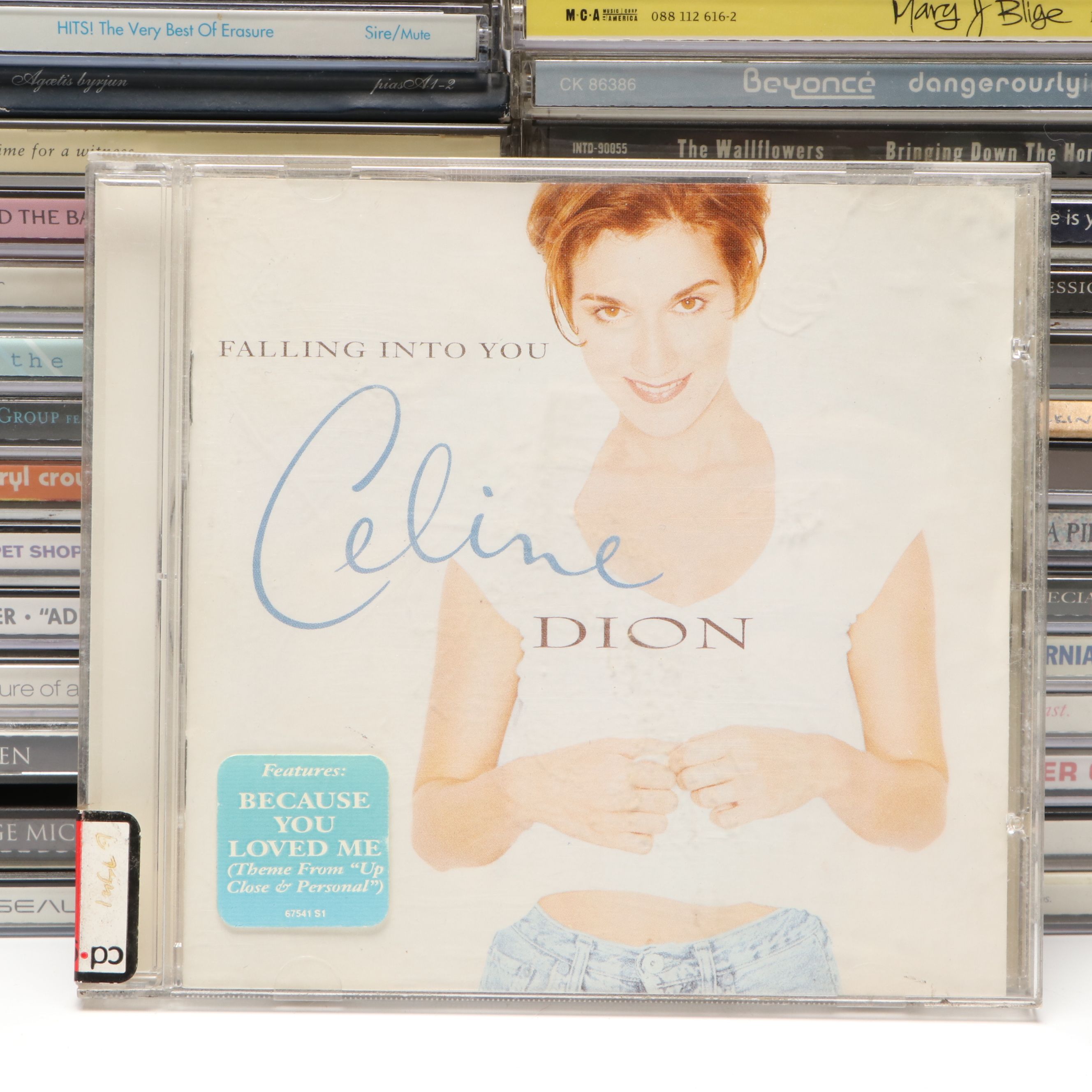 Whitney Houston, Madonna, Pearl Jam, Elton John and More Music CDs