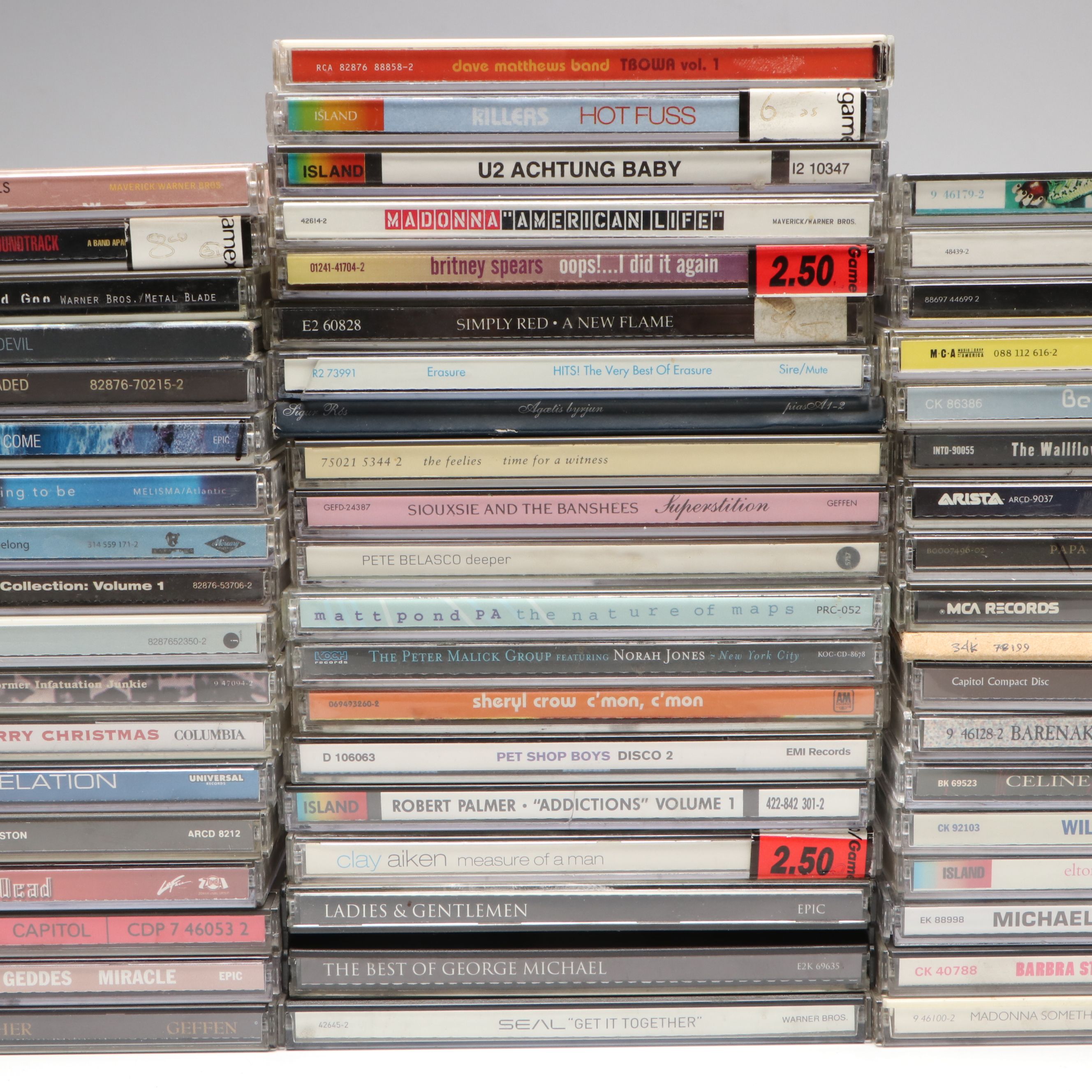 Whitney Houston, Madonna, Pearl Jam, Elton John and More Music CDs