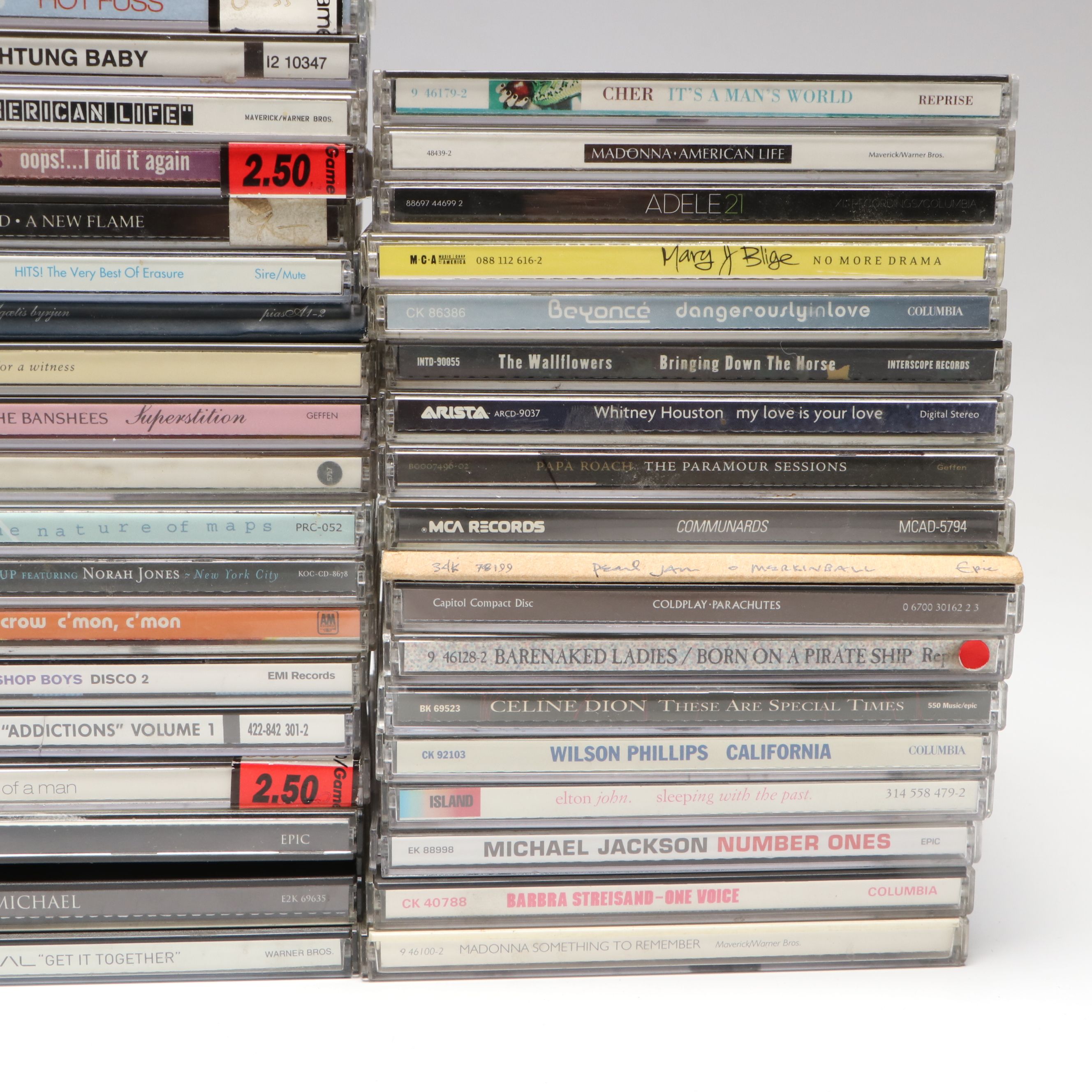 Whitney Houston, Madonna, Pearl Jam, Elton John and More Music CDs