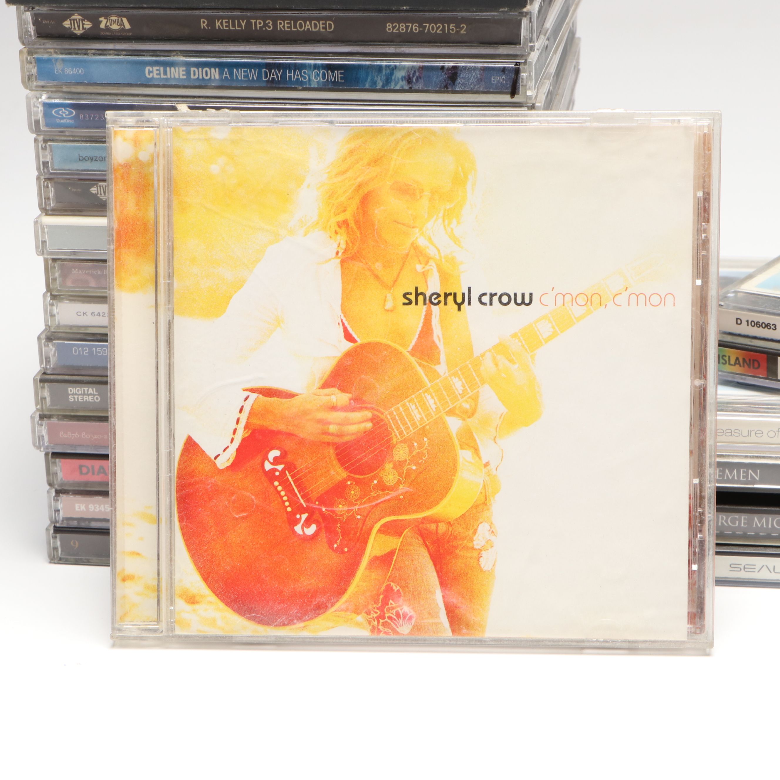 Whitney Houston, Madonna, Pearl Jam, Elton John and More Music CDs