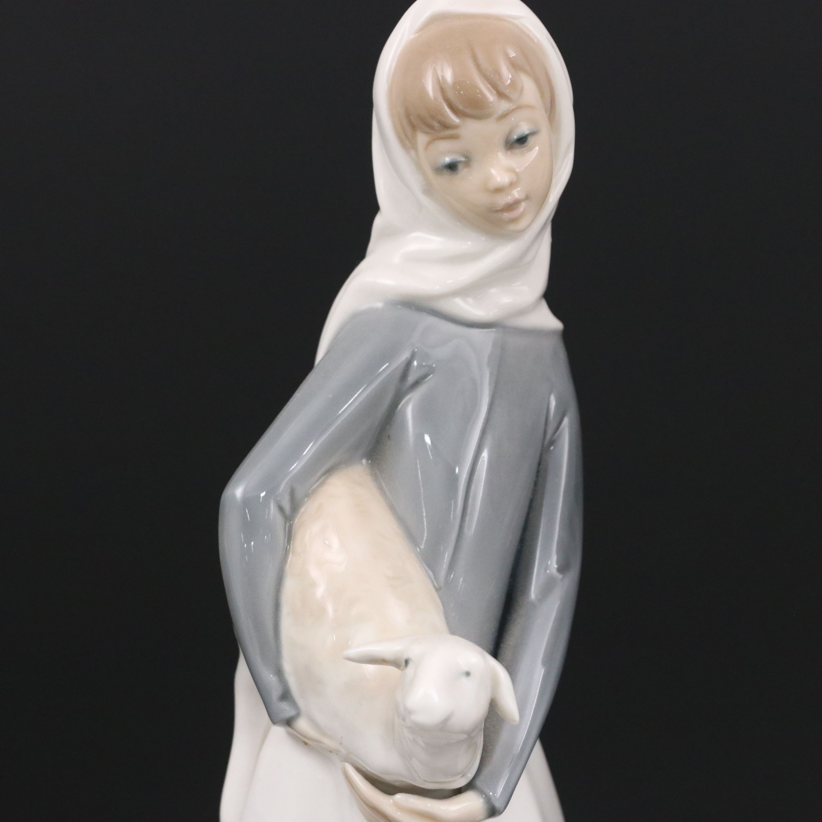 Lladró "Girl with Lamb" and Nao "Suzy" Porcelain Figures, Late 20th Century