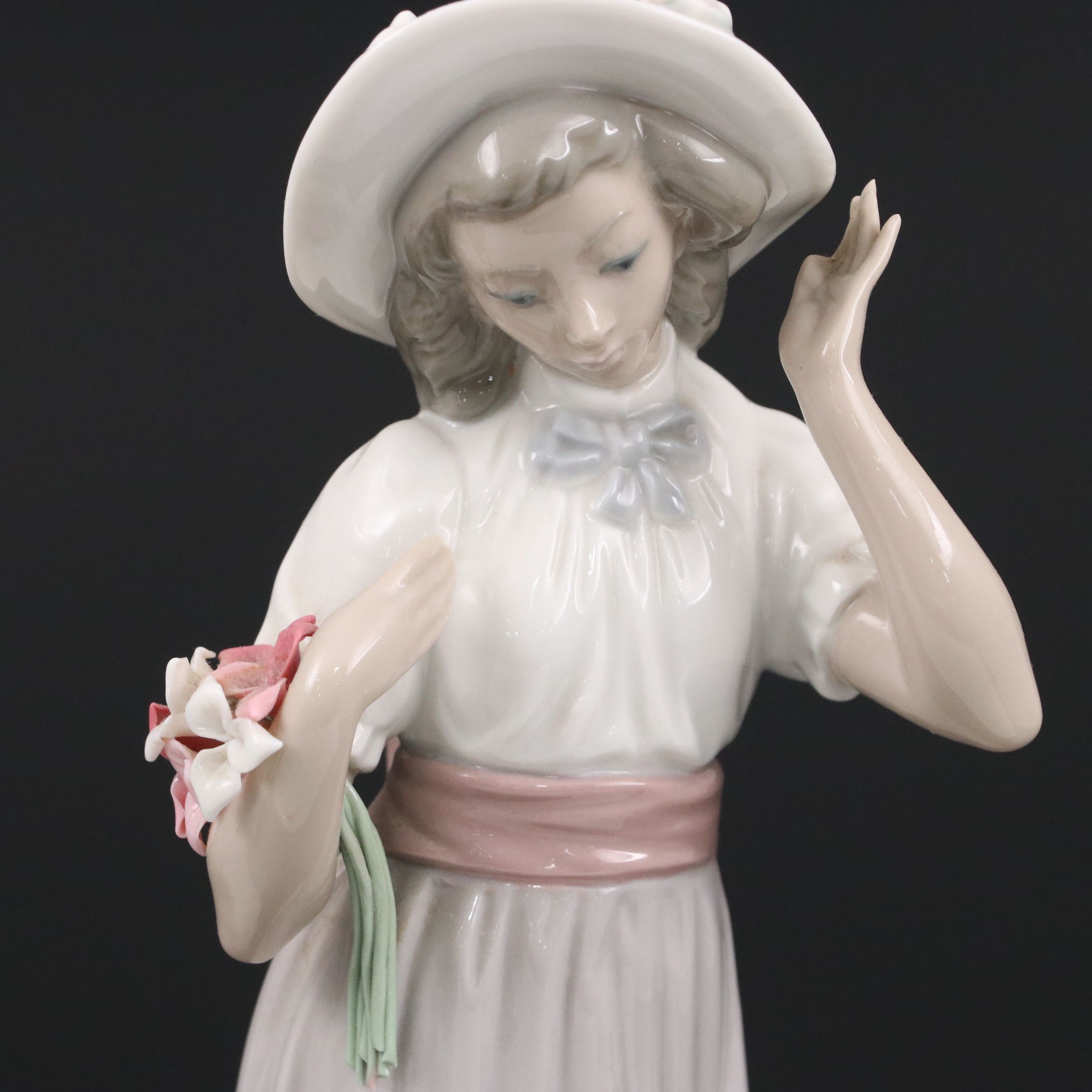 Lladró "Girl with Lamb" and Nao "Suzy" Porcelain Figures, Late 20th Century