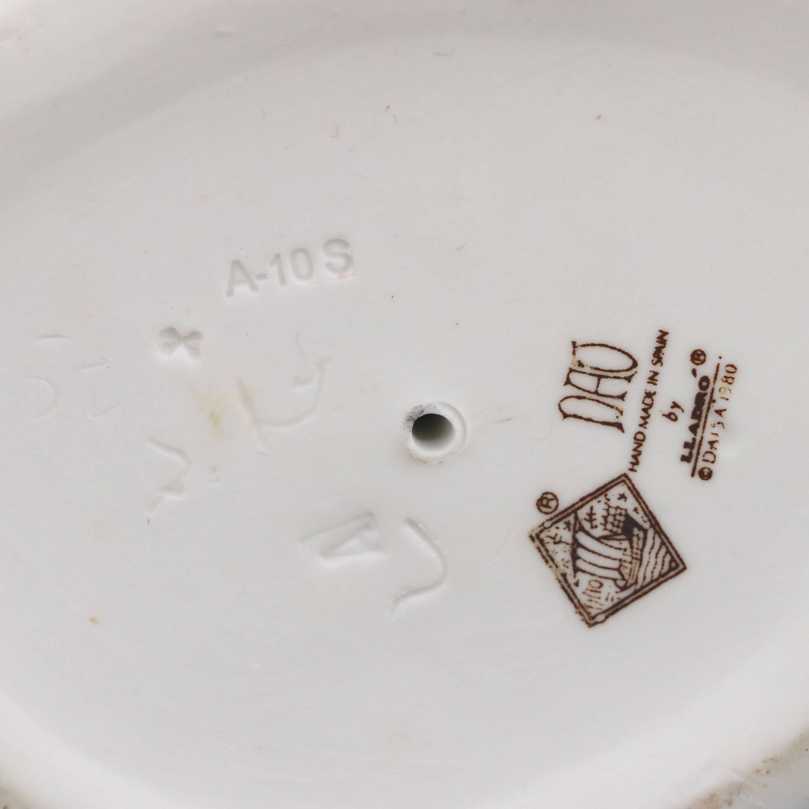 Lladró "Girl with Lamb" and Nao "Suzy" Porcelain Figures, Late 20th Century