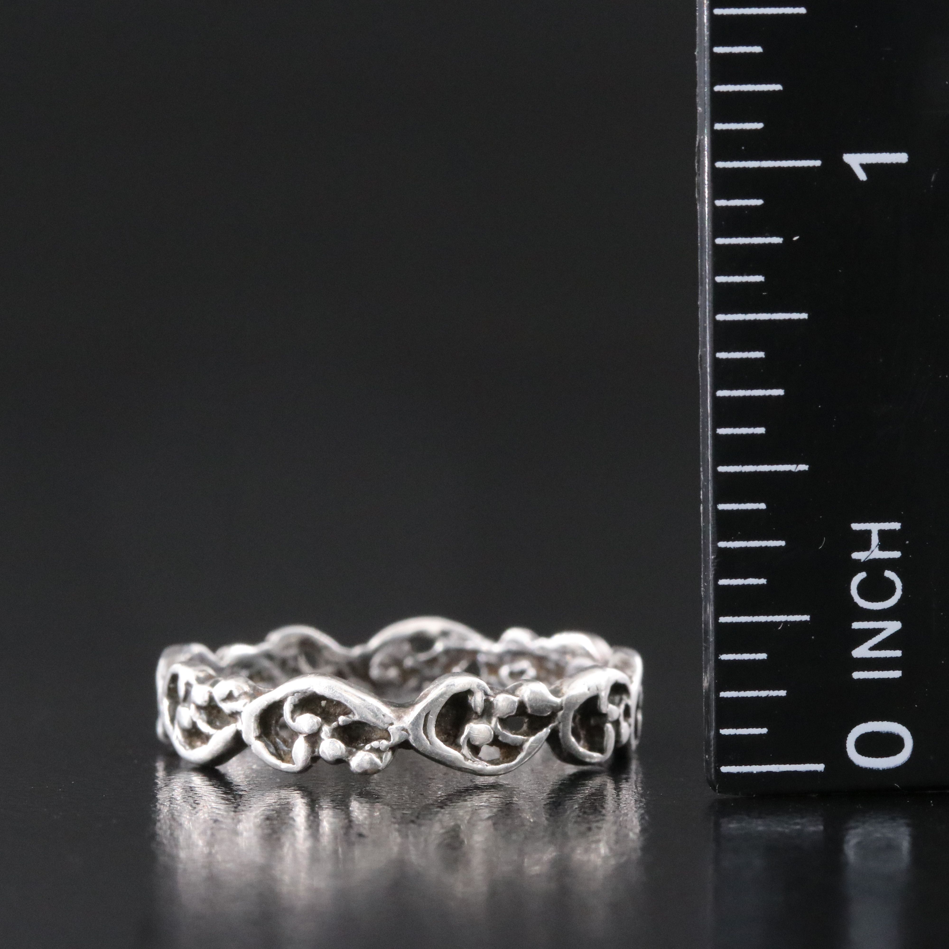 Sterling Scroll Motif Eternity Band