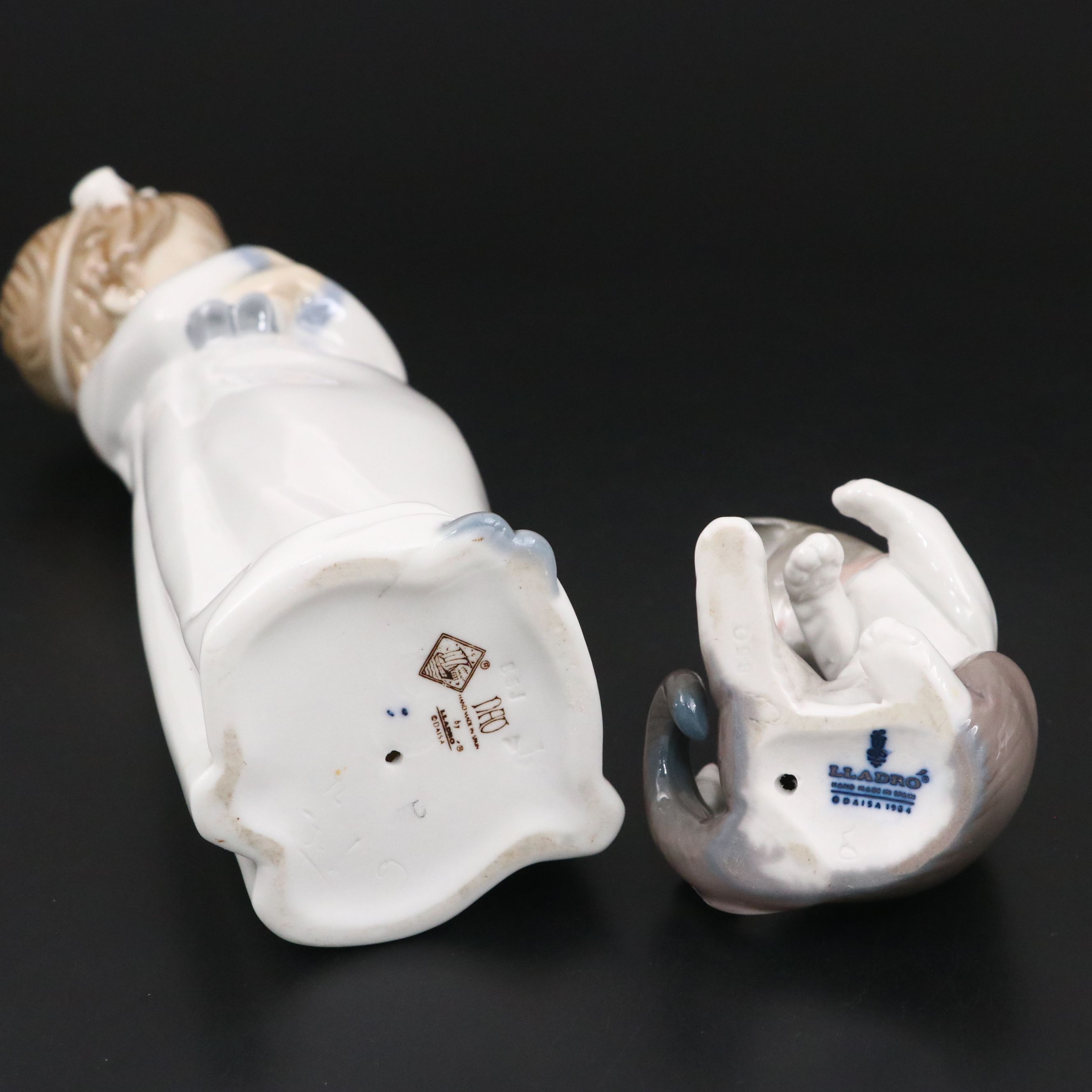Lladró "Cat and Mouse" and "Girl Holding Doll" Porcelain Figurines