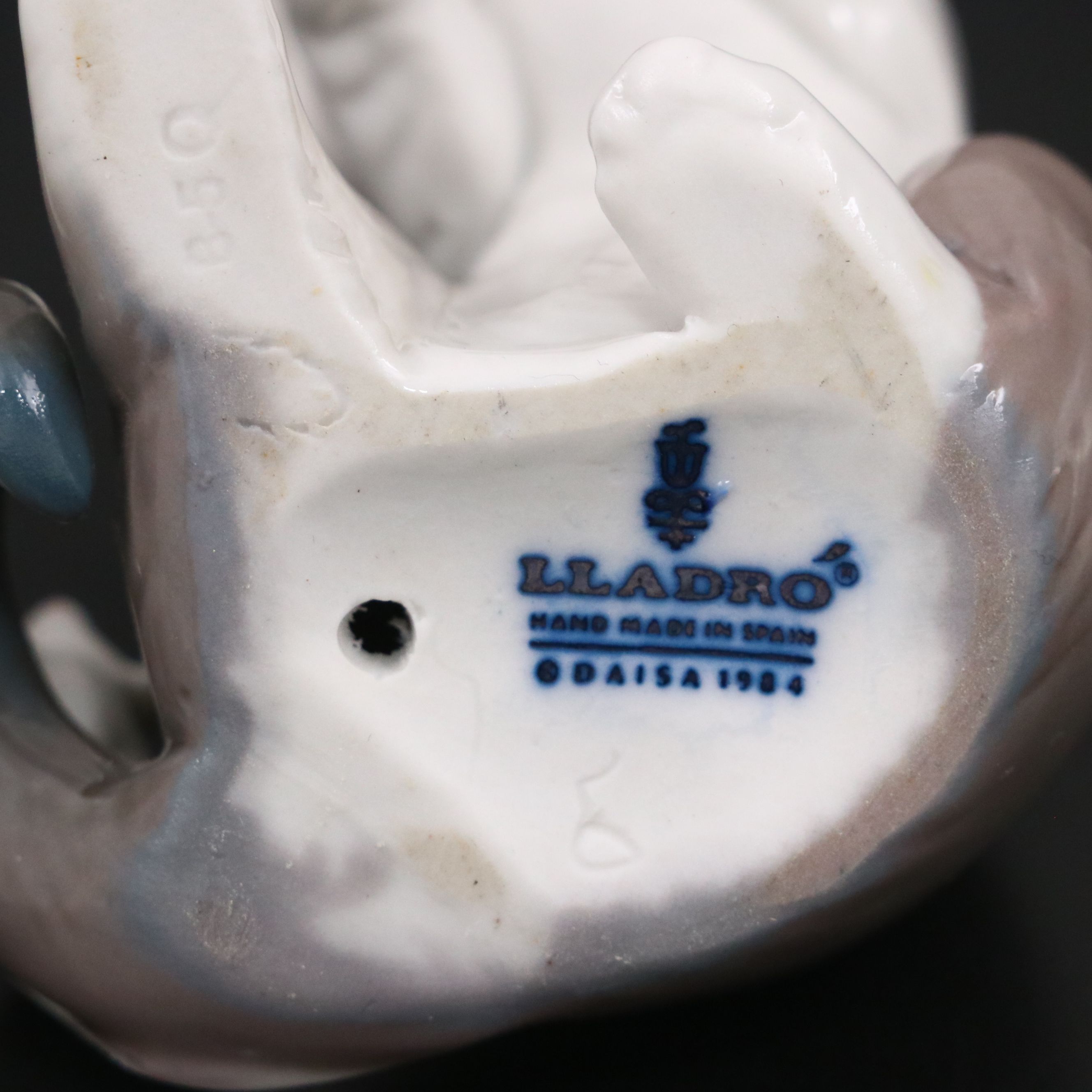 Lladró "Cat and Mouse" and "Girl Holding Doll" Porcelain Figurines