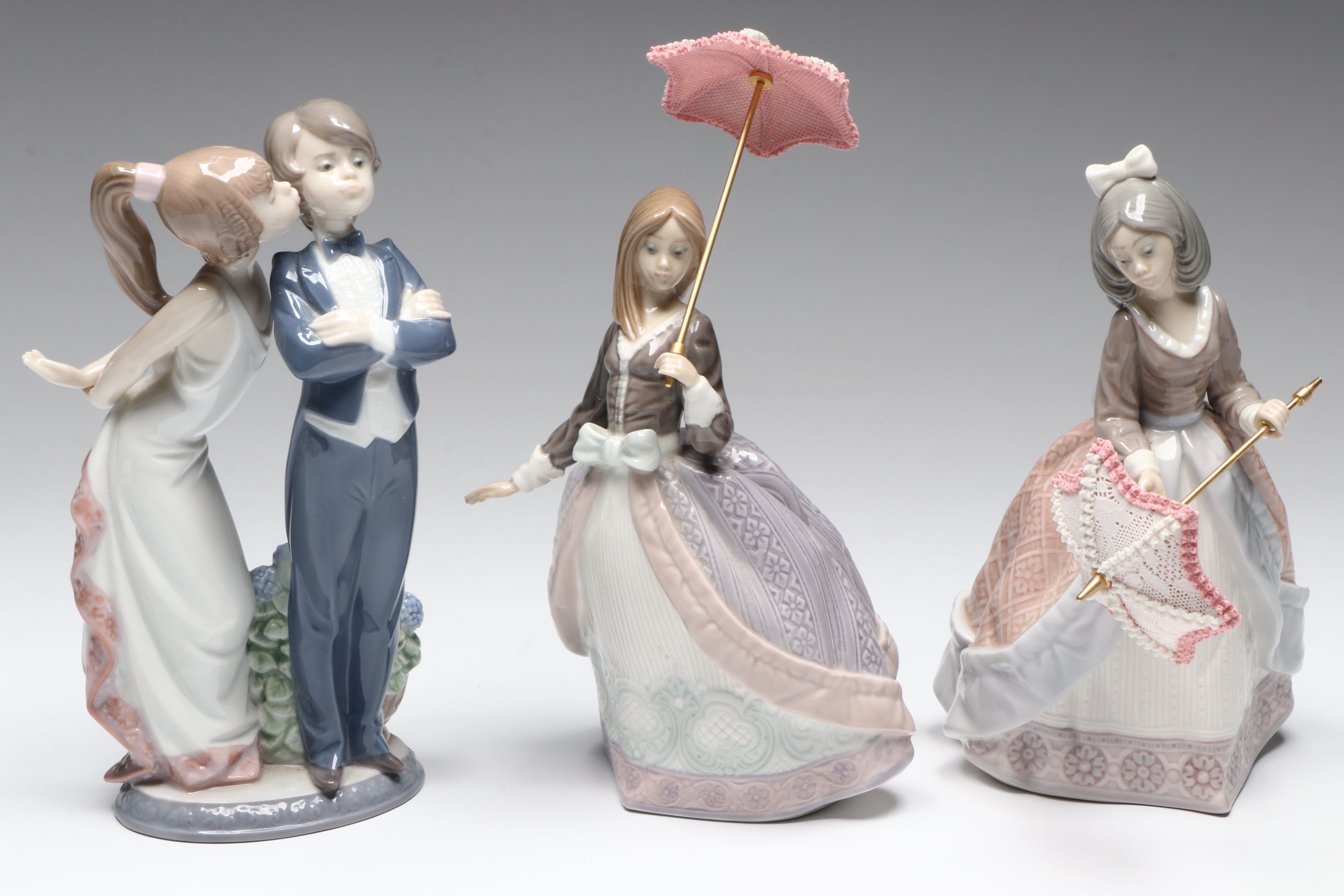 Lladró "Jolie," "Angela," and "Let's Make Up" Porcelain Figurines