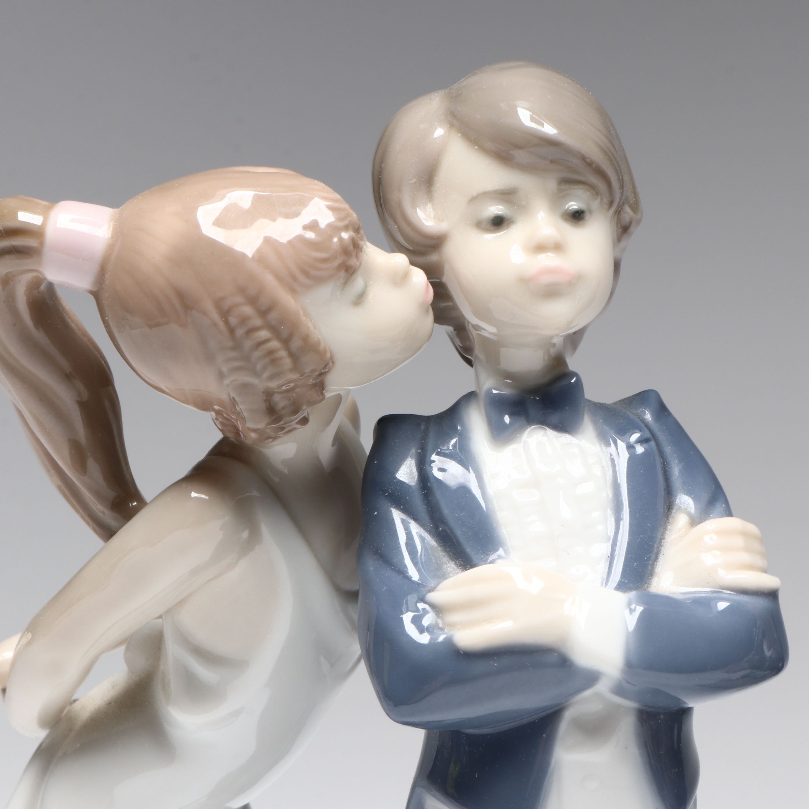 Lladró "Jolie," "Angela," and "Let's Make Up" Porcelain Figurines