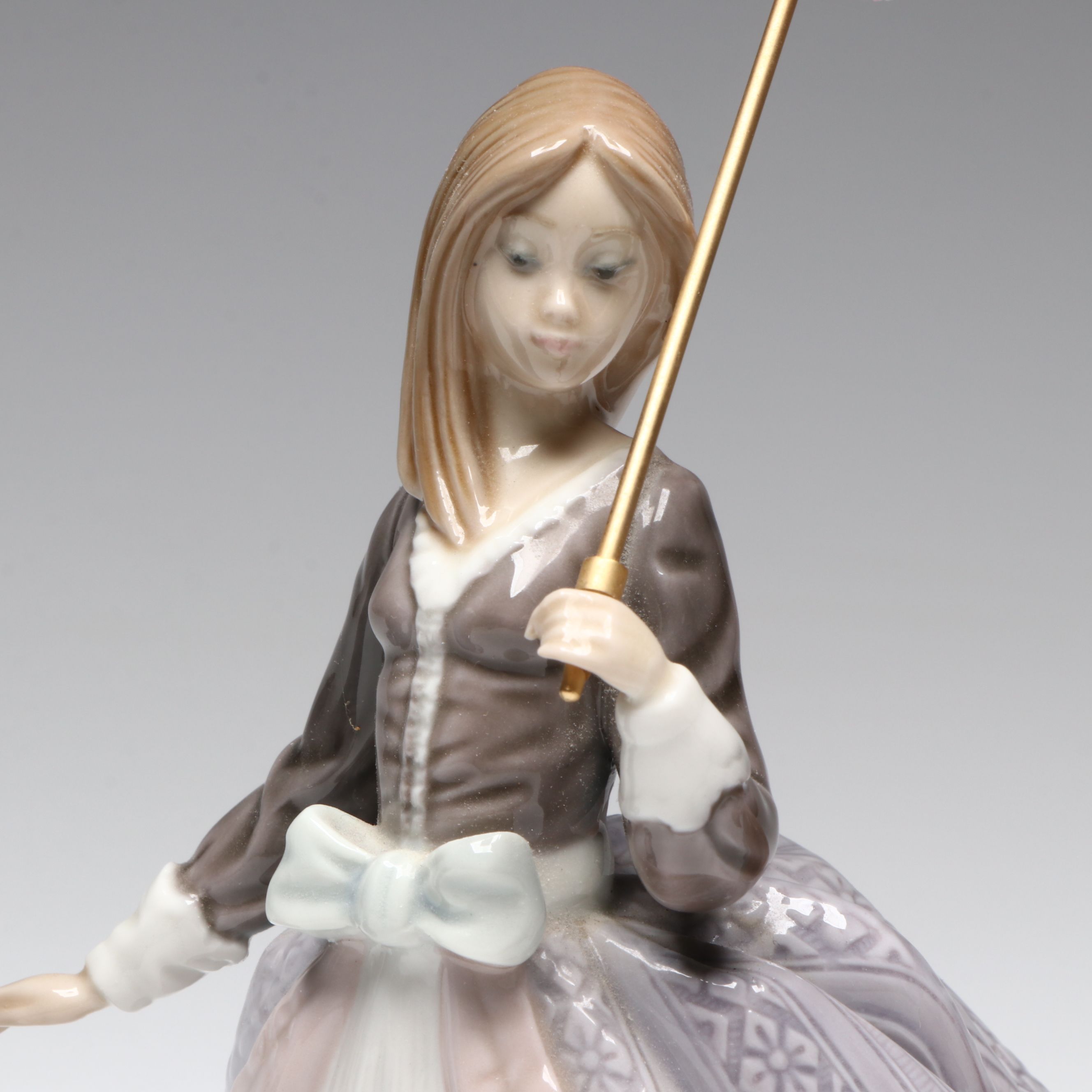 Lladró "Jolie," "Angela," and "Let's Make Up" Porcelain Figurines