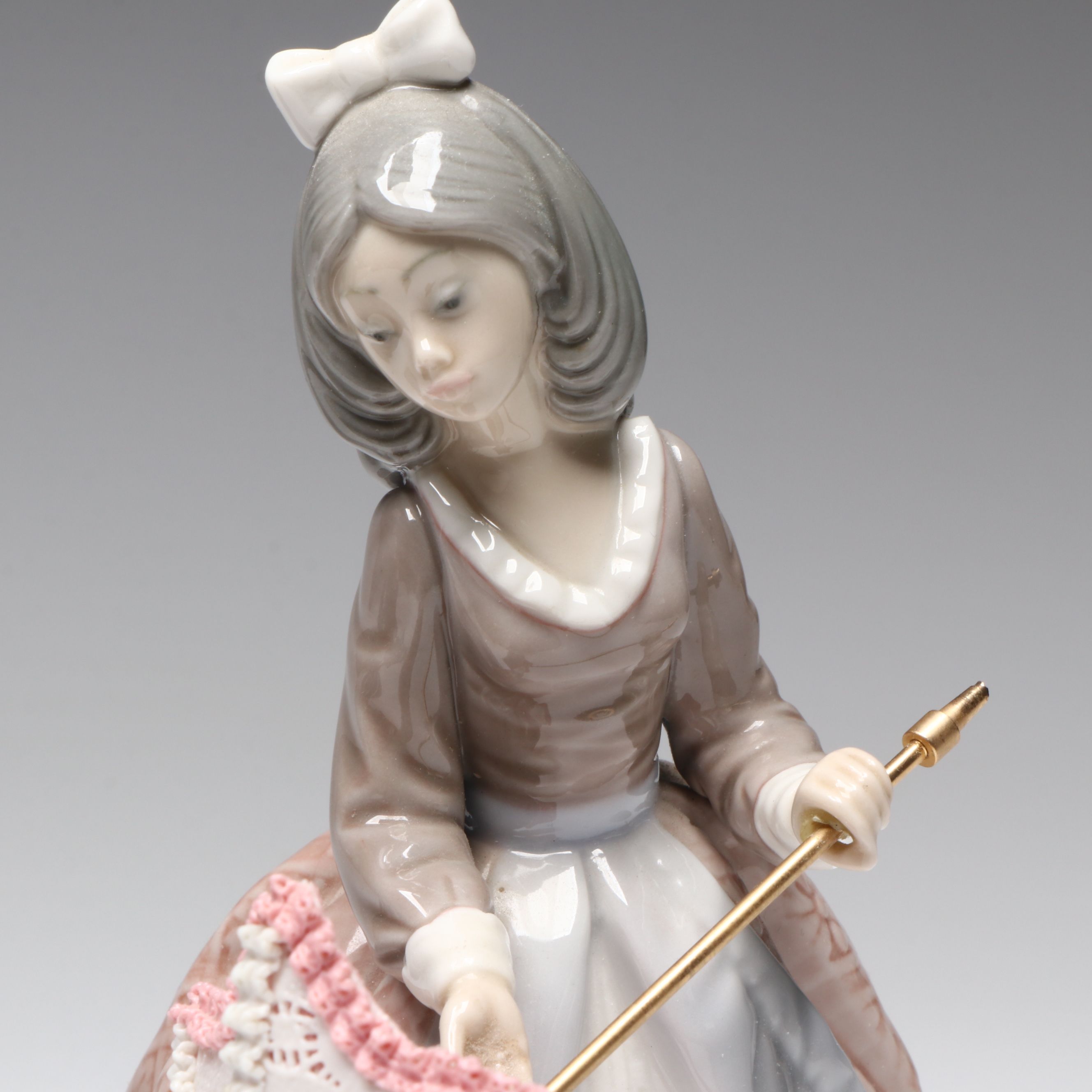 Lladró "Jolie," "Angela," and "Let's Make Up" Porcelain Figurines