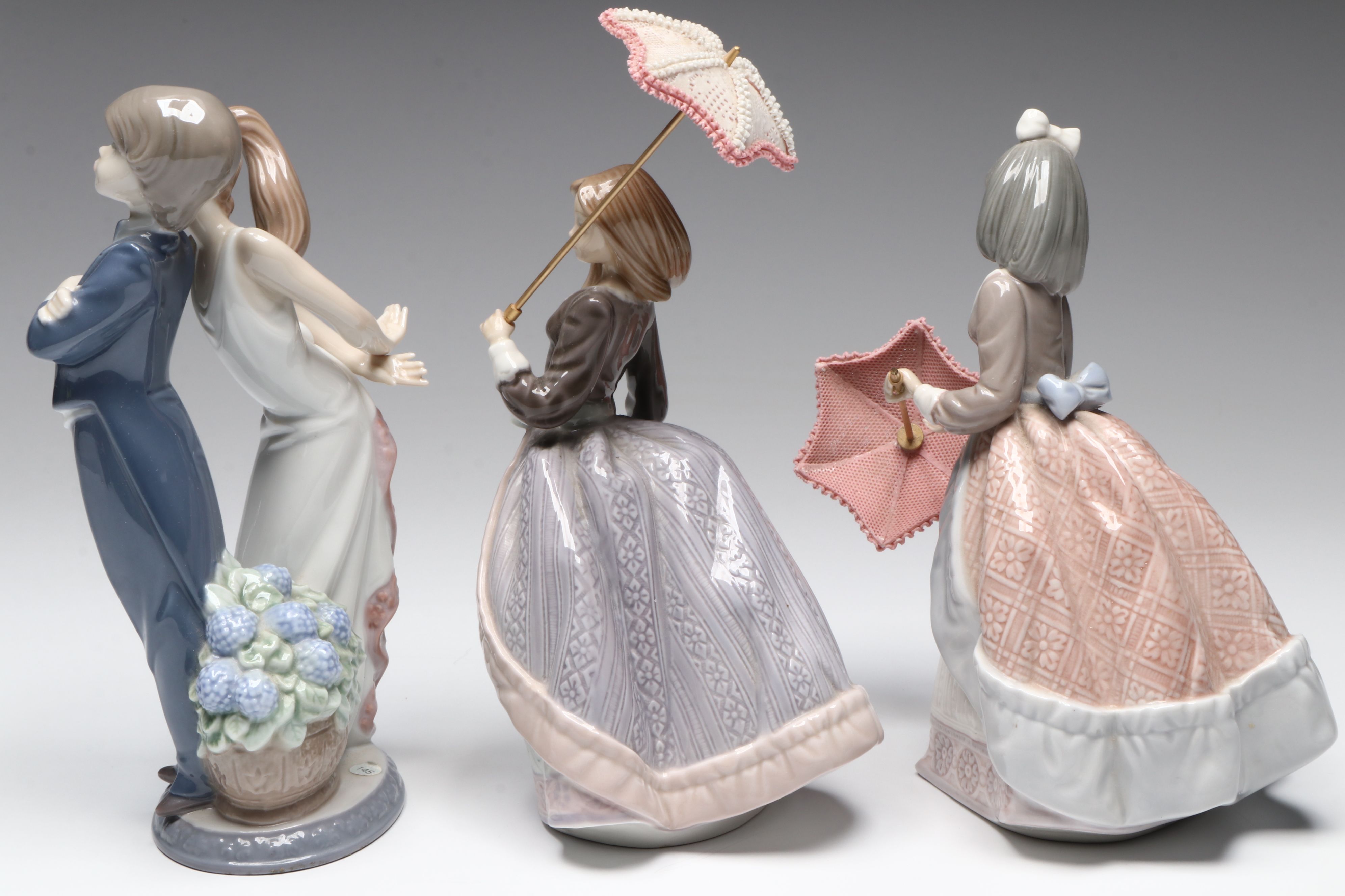 Lladró "Jolie," "Angela," and "Let's Make Up" Porcelain Figurines