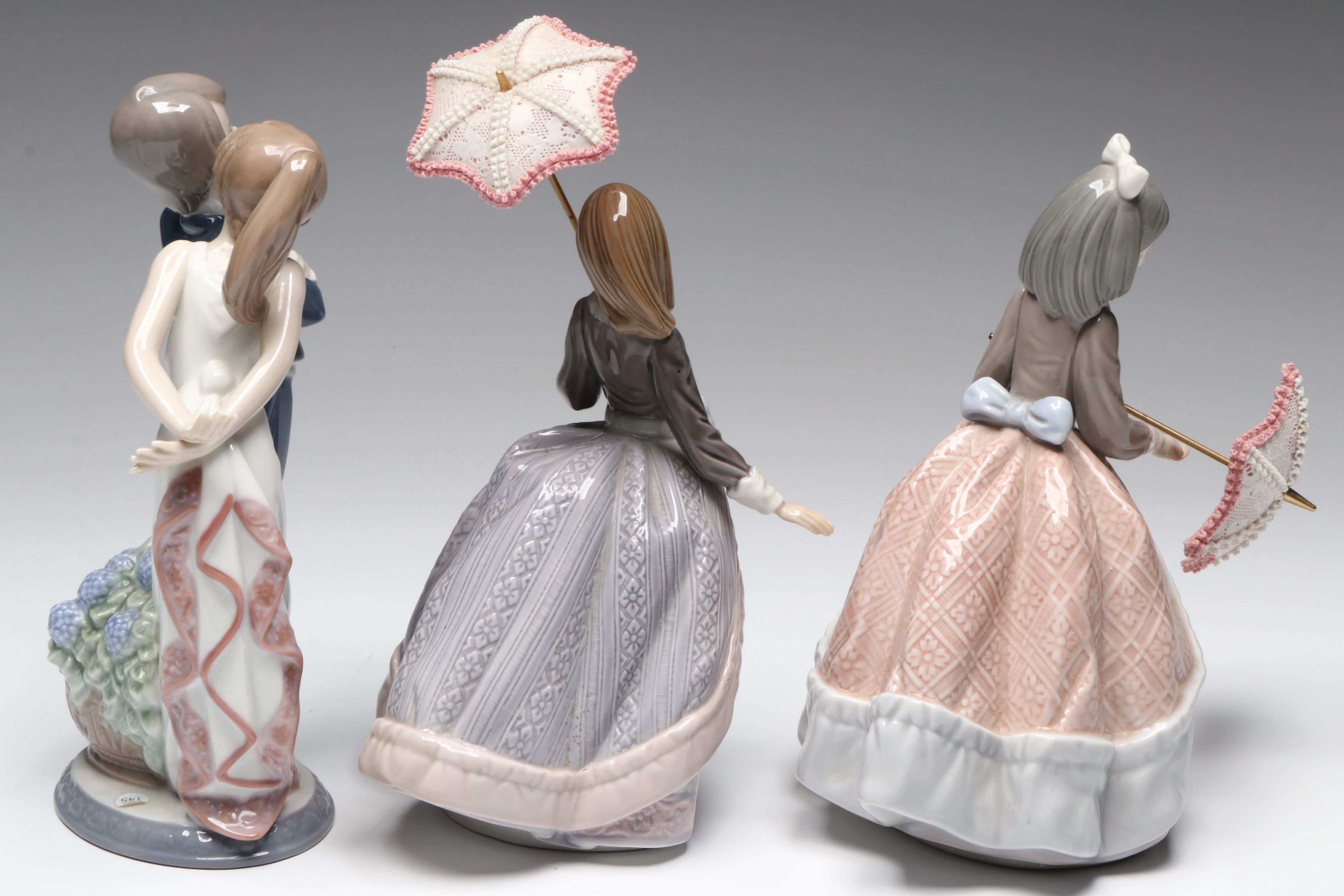 Lladró "Jolie," "Angela," and "Let's Make Up" Porcelain Figurines