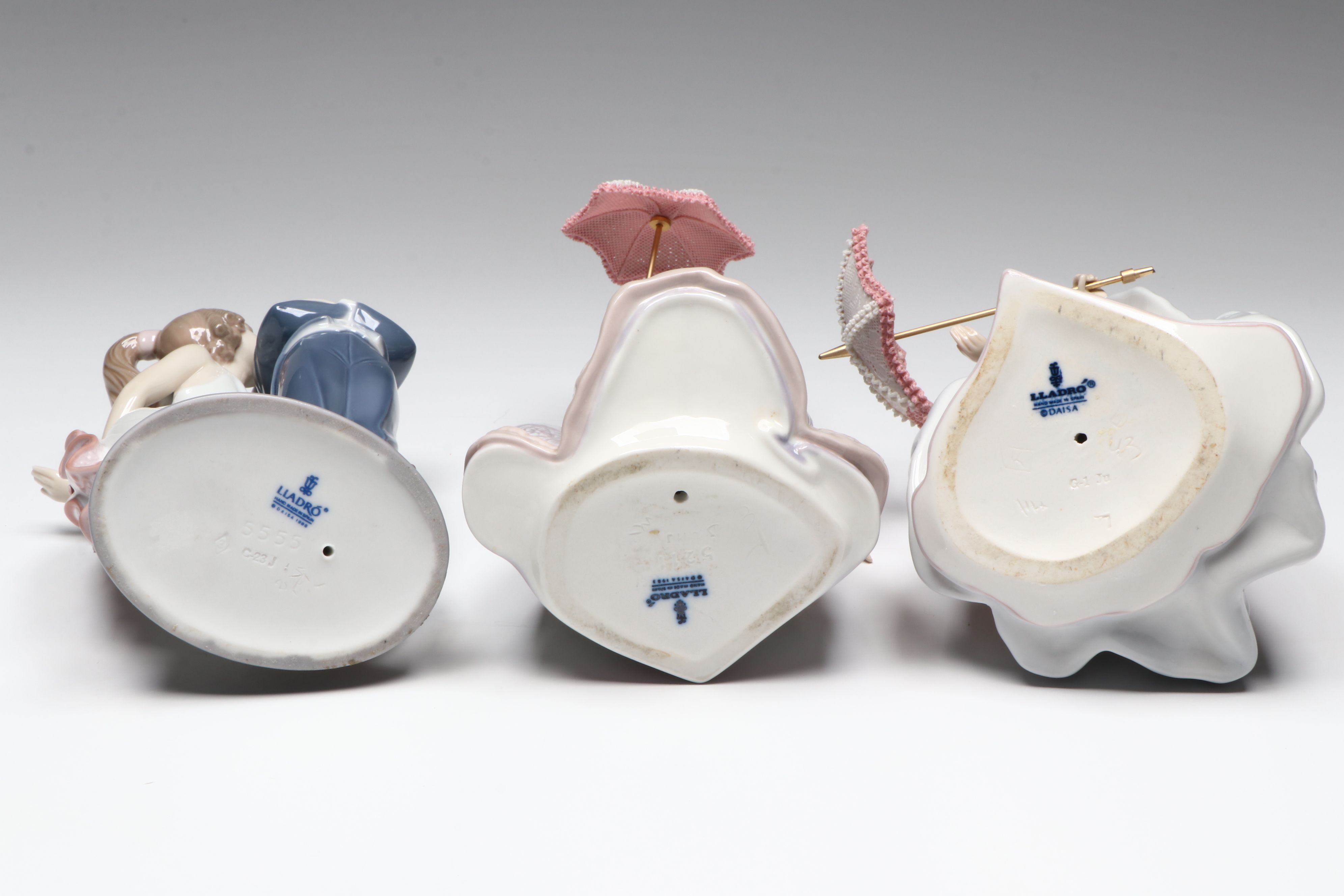 Lladró "Jolie," "Angela," and "Let's Make Up" Porcelain Figurines