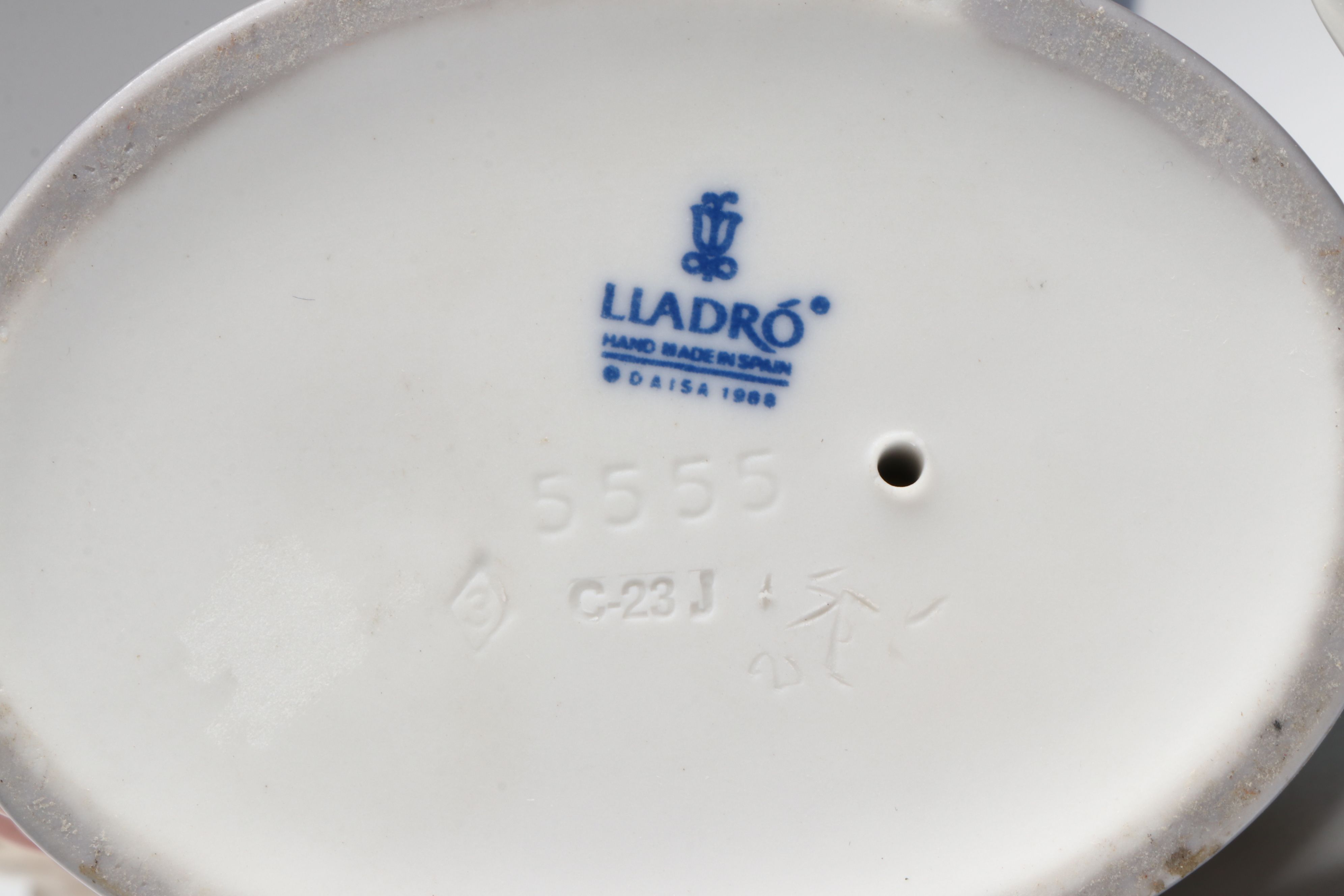 Lladró "Jolie," "Angela," and "Let's Make Up" Porcelain Figurines