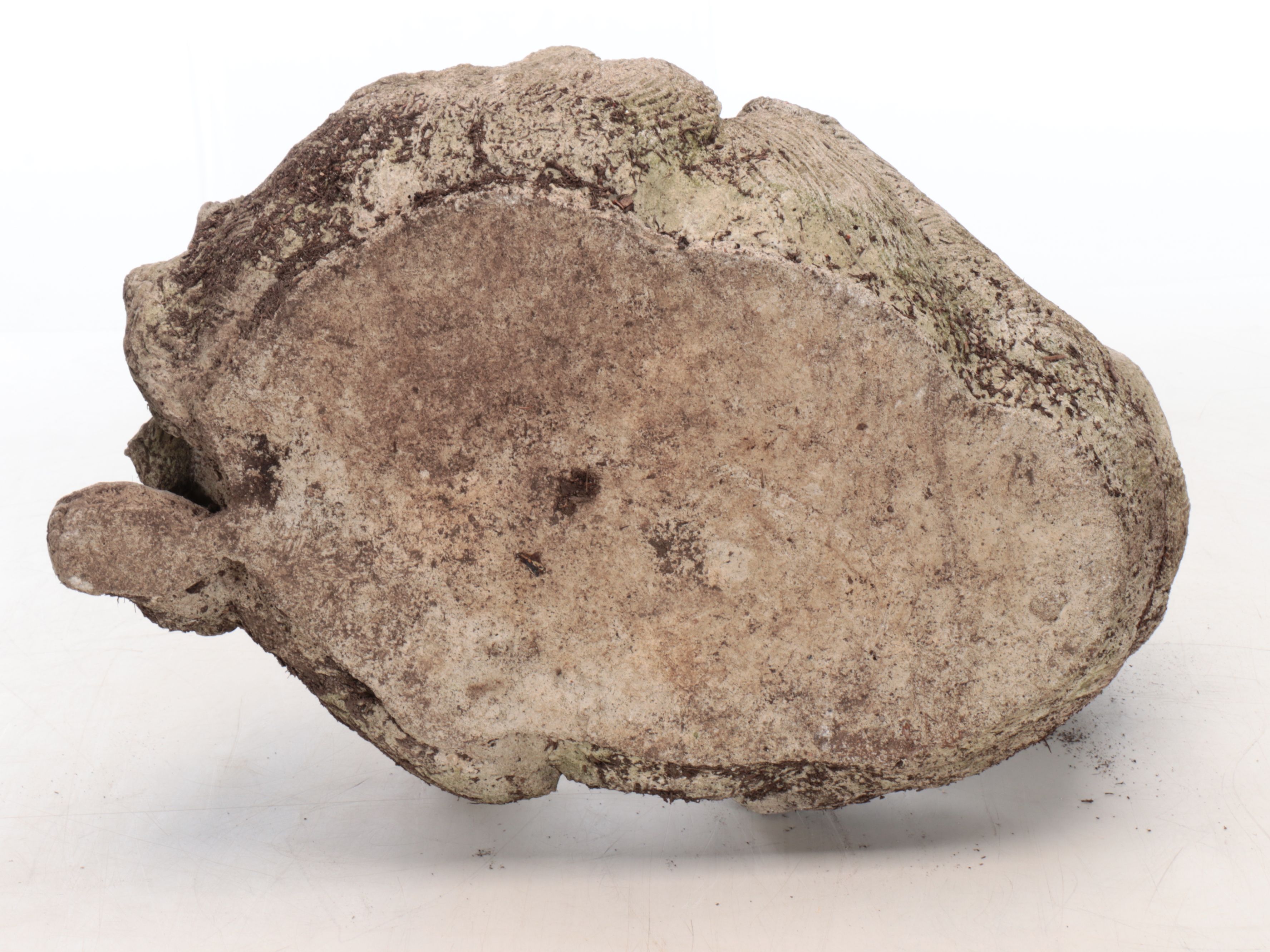 Weathered Cat Lying on Back Stone Garden Planter