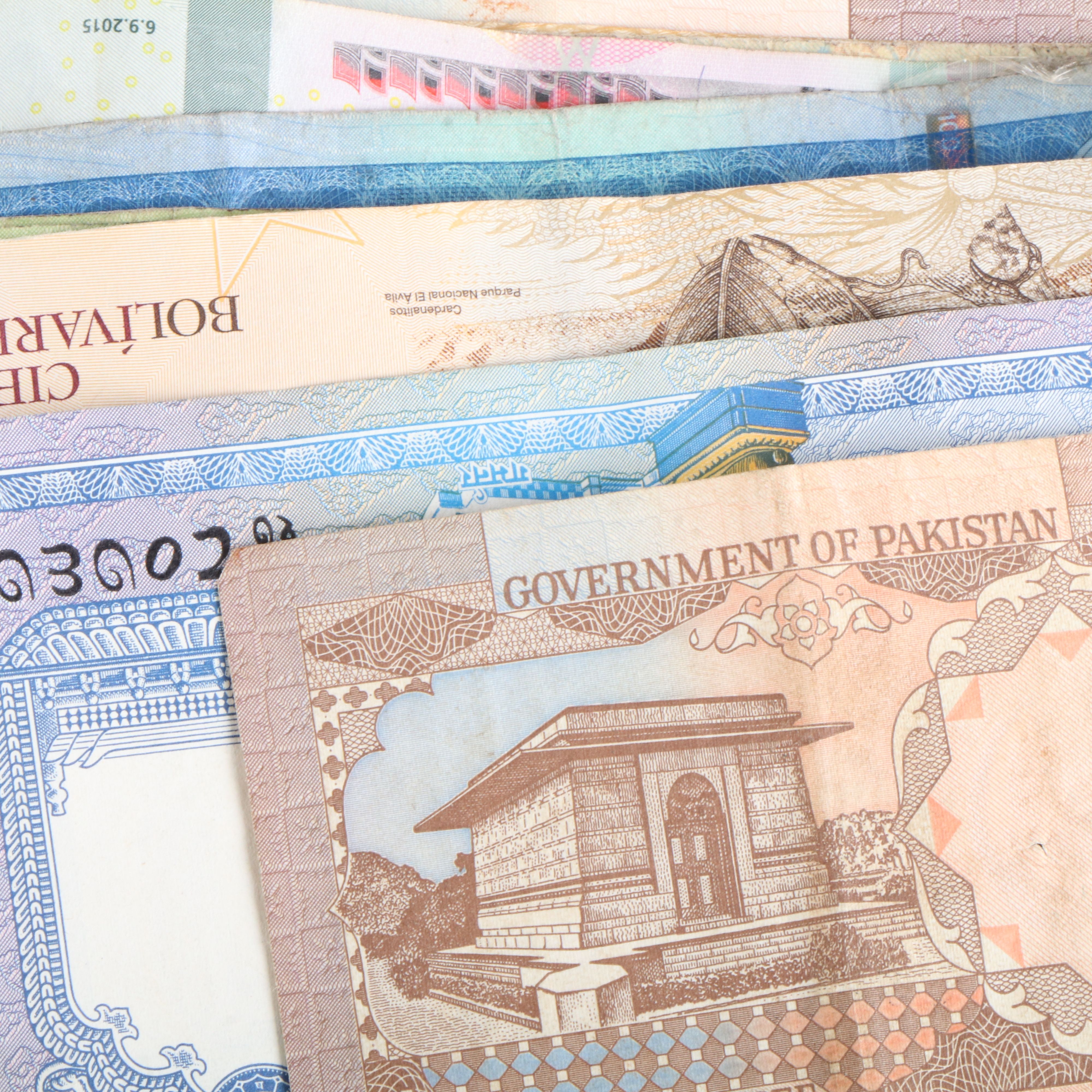 Collection of 22 Pounds of Foreign Coins and 50 Foreign Currency Notes