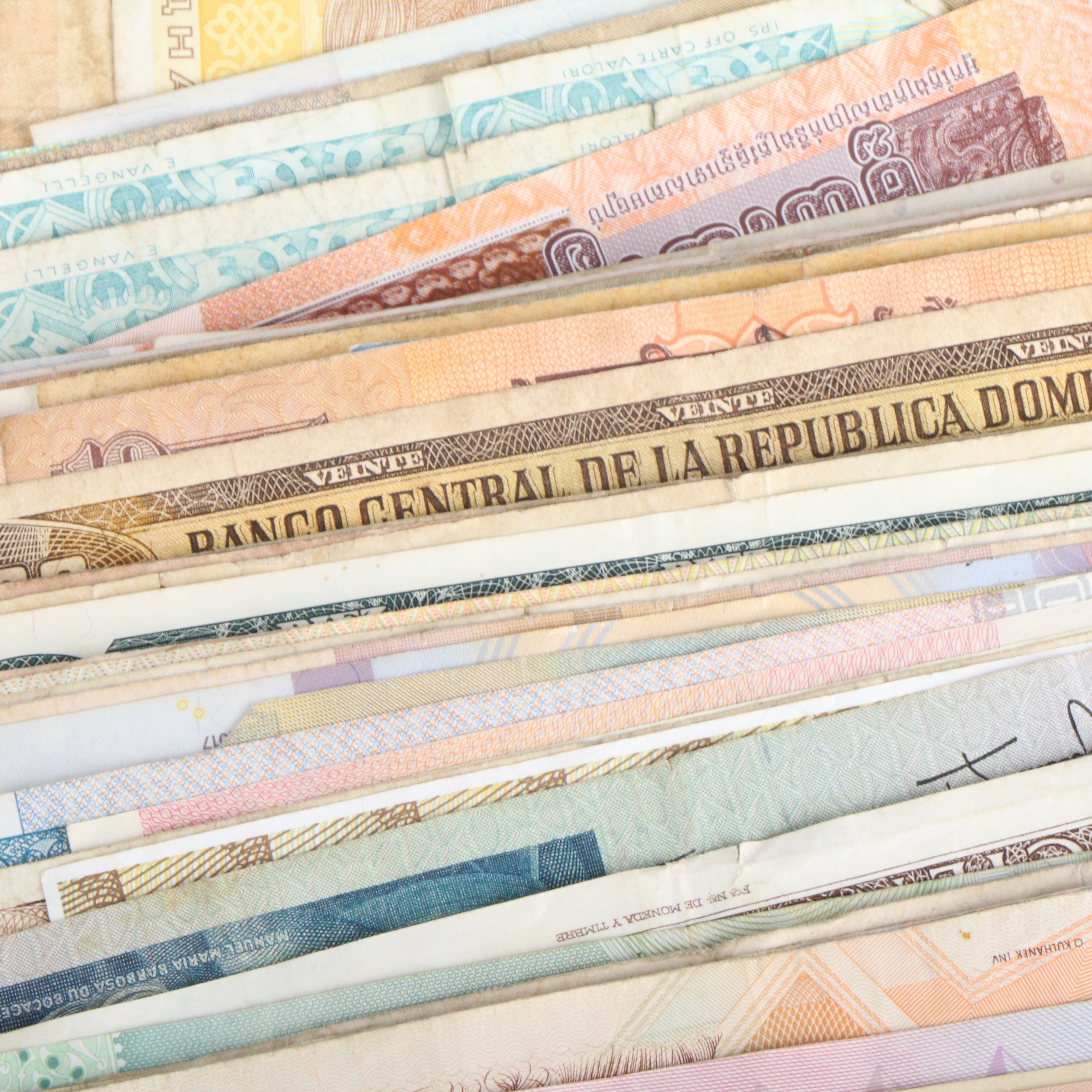 Collection of 22 Pounds of Foreign Coins and 50 Foreign Currency Notes