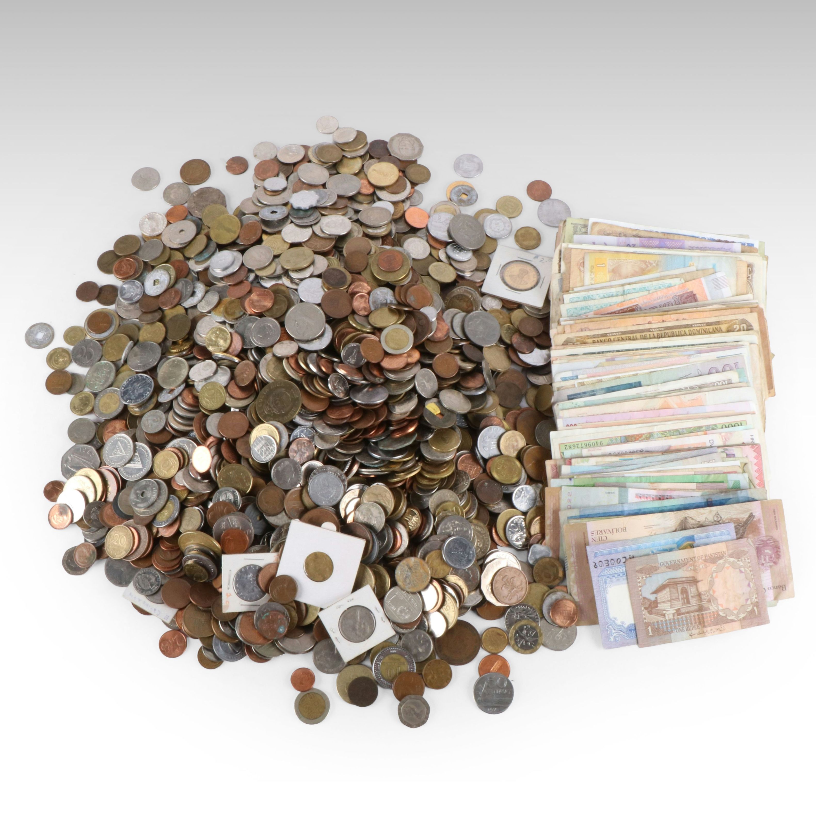 Collection of 22 Pounds of Foreign Coins and 50 Foreign Currency Notes