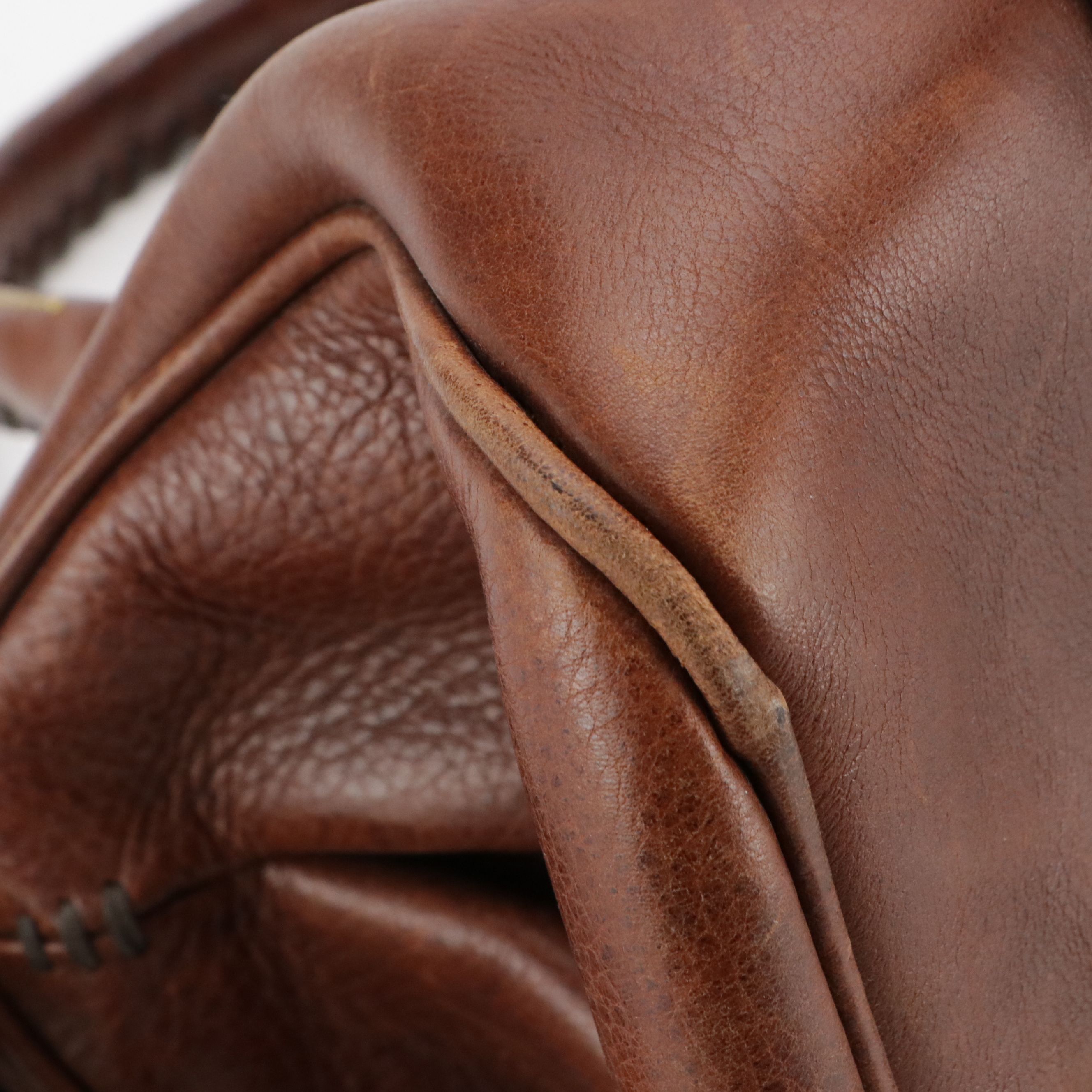 Dooney & Bourke Tassel Two-Way Satchel in Florentine Leather