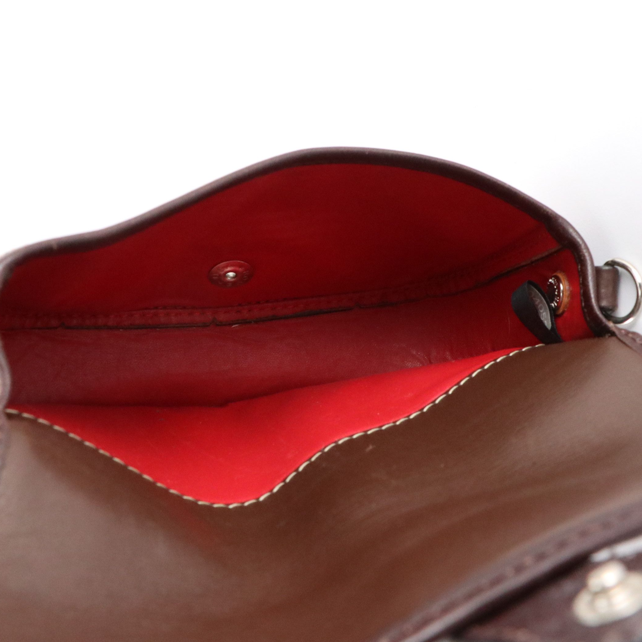 Dooney & Bourke Flap Wristlet with Coach Signature Stripe Clutch Wallets