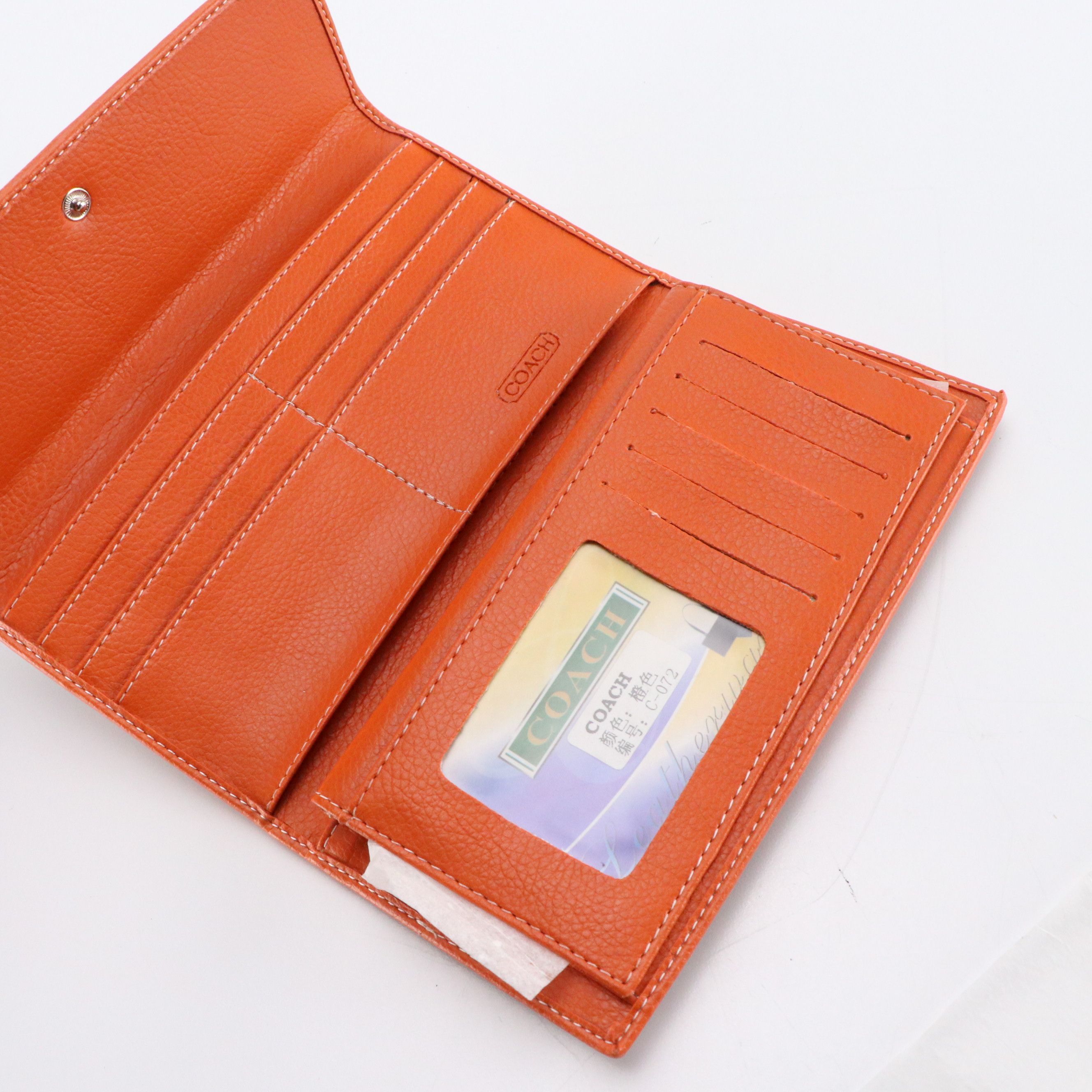 Dooney & Bourke Flap Wristlet with Coach Signature Stripe Clutch Wallets